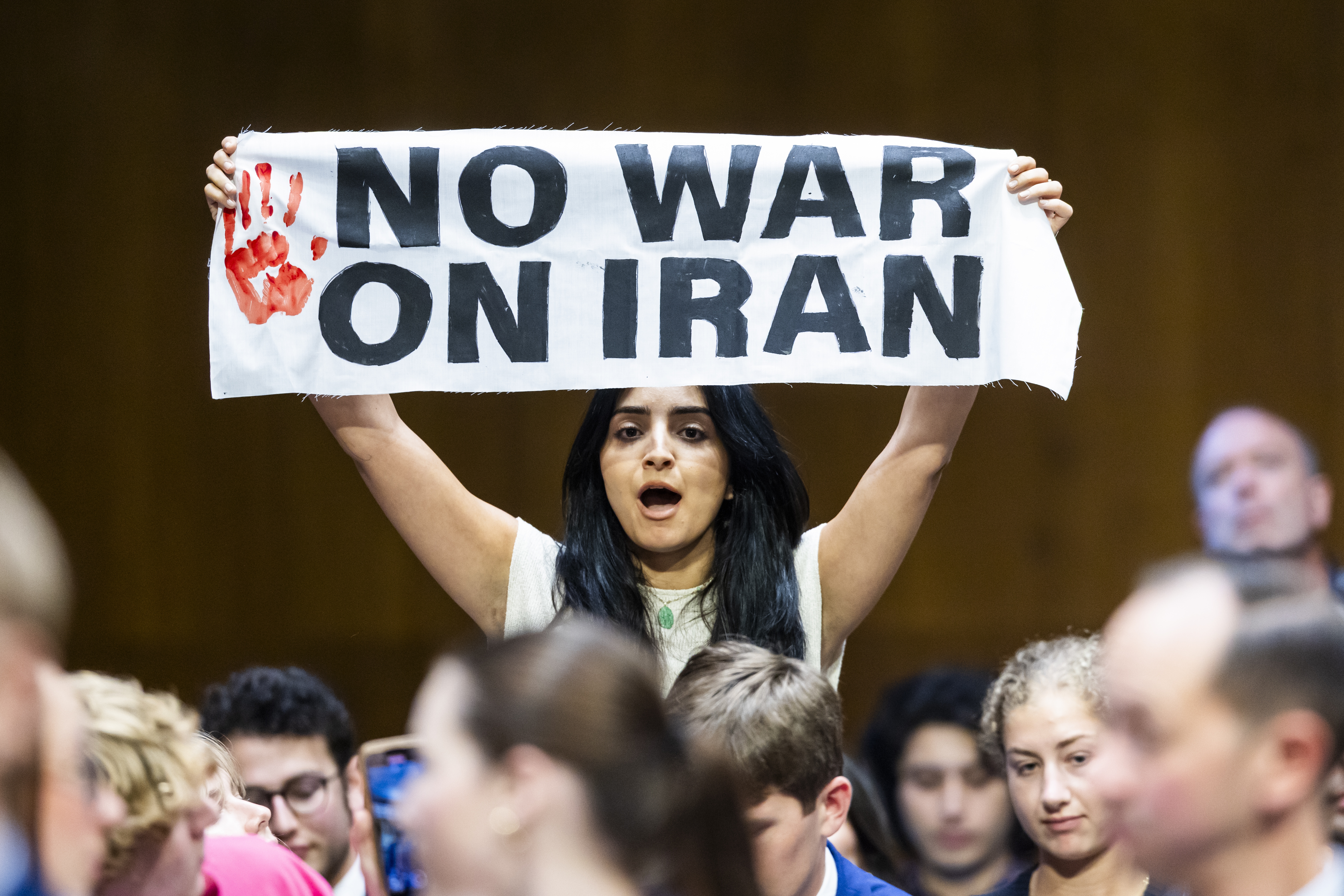 n anti-war protester stands up as US Secretary of Defense Hegseth and Chairman of the Joint Chiefs General John testify on the Defense Department's budget before the Senate Committee on Appropriations in t