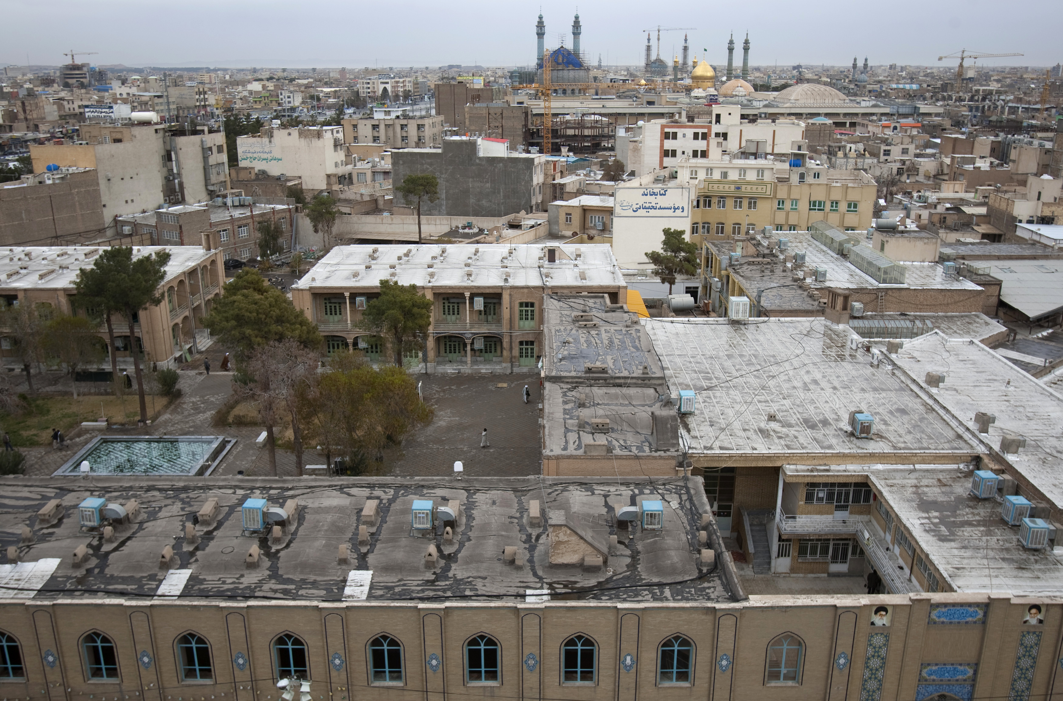 A view of Hojjatieh seminary (bottom) and the holy shrine of Hazrat Masoumeh (top), in the holy city of Qom, on March 9, 2011