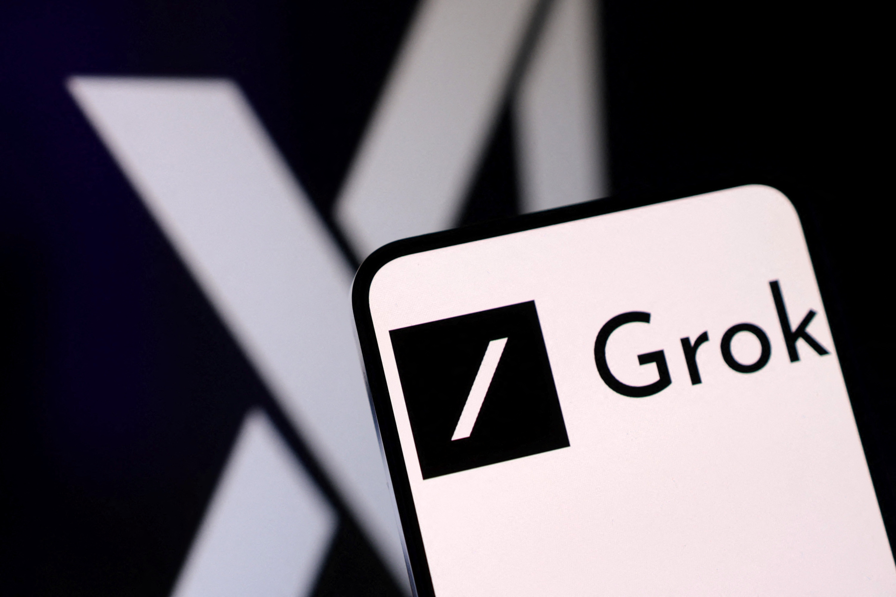 xAI and Grok logos are seen in this illustration taken, February 16, 2025. REUTERS/Dado Ruvic/Illustration