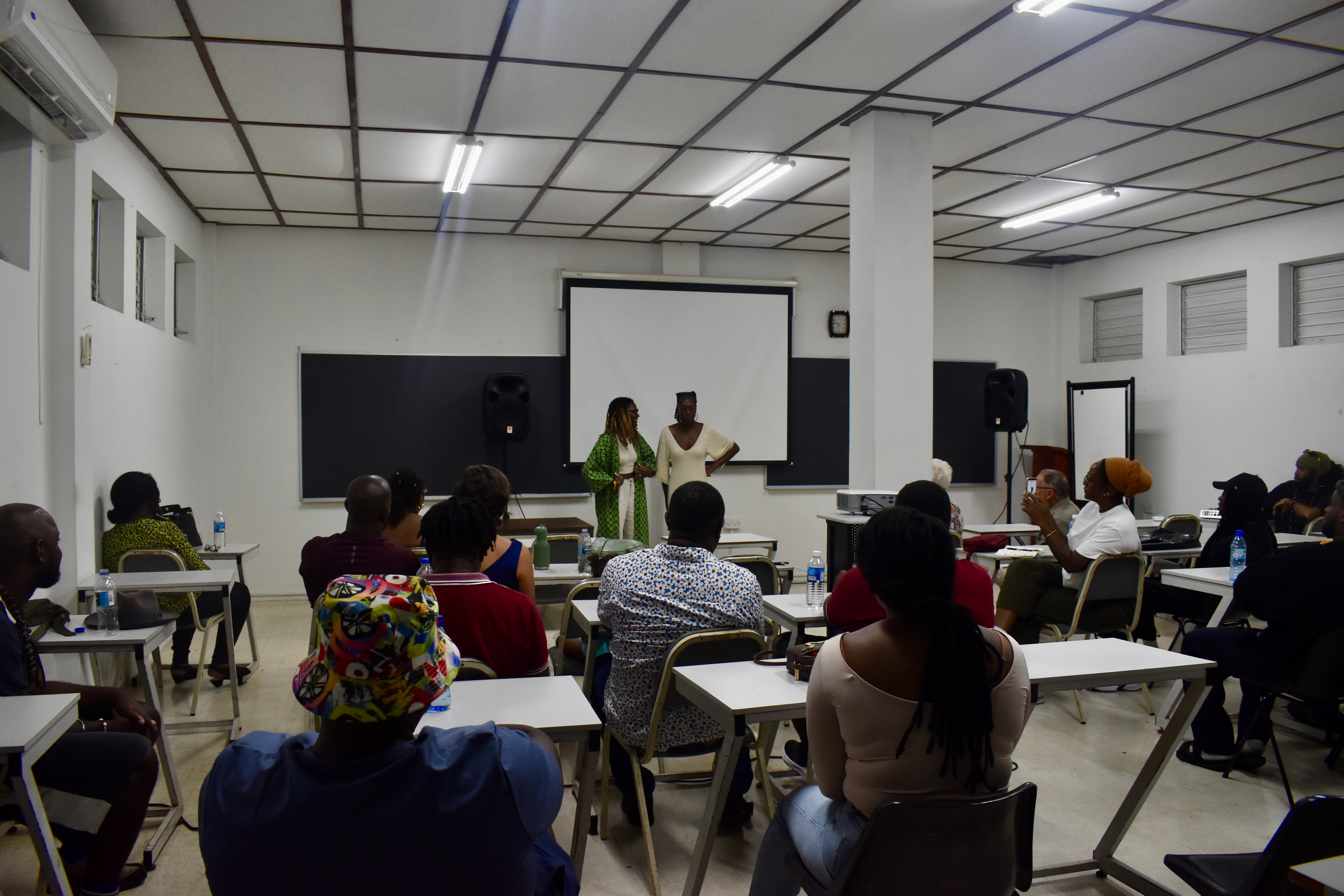 Participants gather for a film screening as part of an Archive Liberia event [Bilphena Decontee Yahwon/Al Jazeera]
