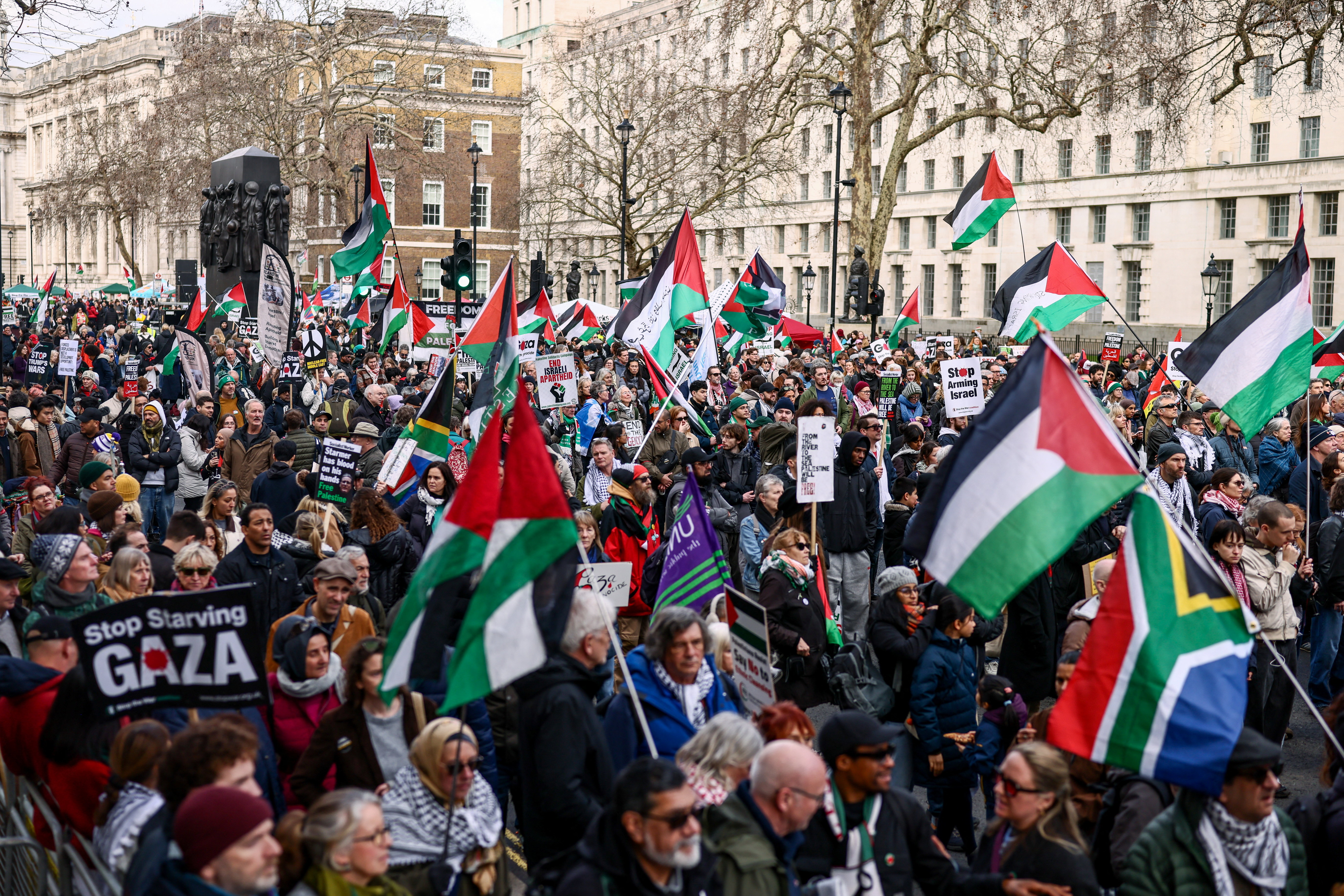 People gather on Whitehall during the National March for Palestine – Hands off Gaza, a pro-Palestinian protest calling for the government to “end the genocide and stop arming Israel”, in London, UK, January 31, 2026
