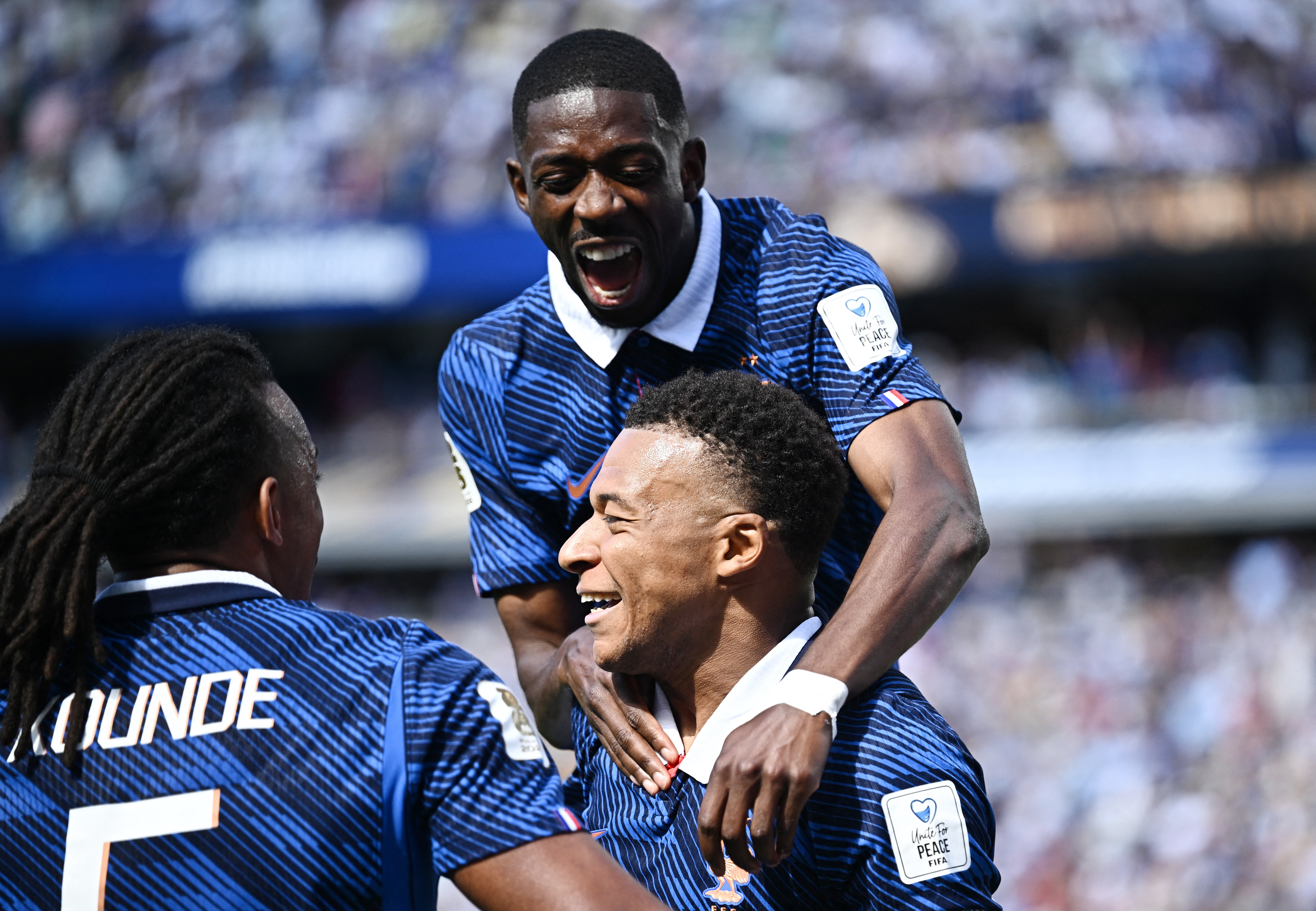 Soccer Football - FIFA World Cup 2026 - Group I - France v Senegal - New York/New Jersey Stadium, East Rutherford, New Jersey, U.S. - June 16, 2026 France's Kylian Mbappe celebrates scoring their first goal with Ousmane Dembele and Jules Kounde REUTERS/Dylan Martinez