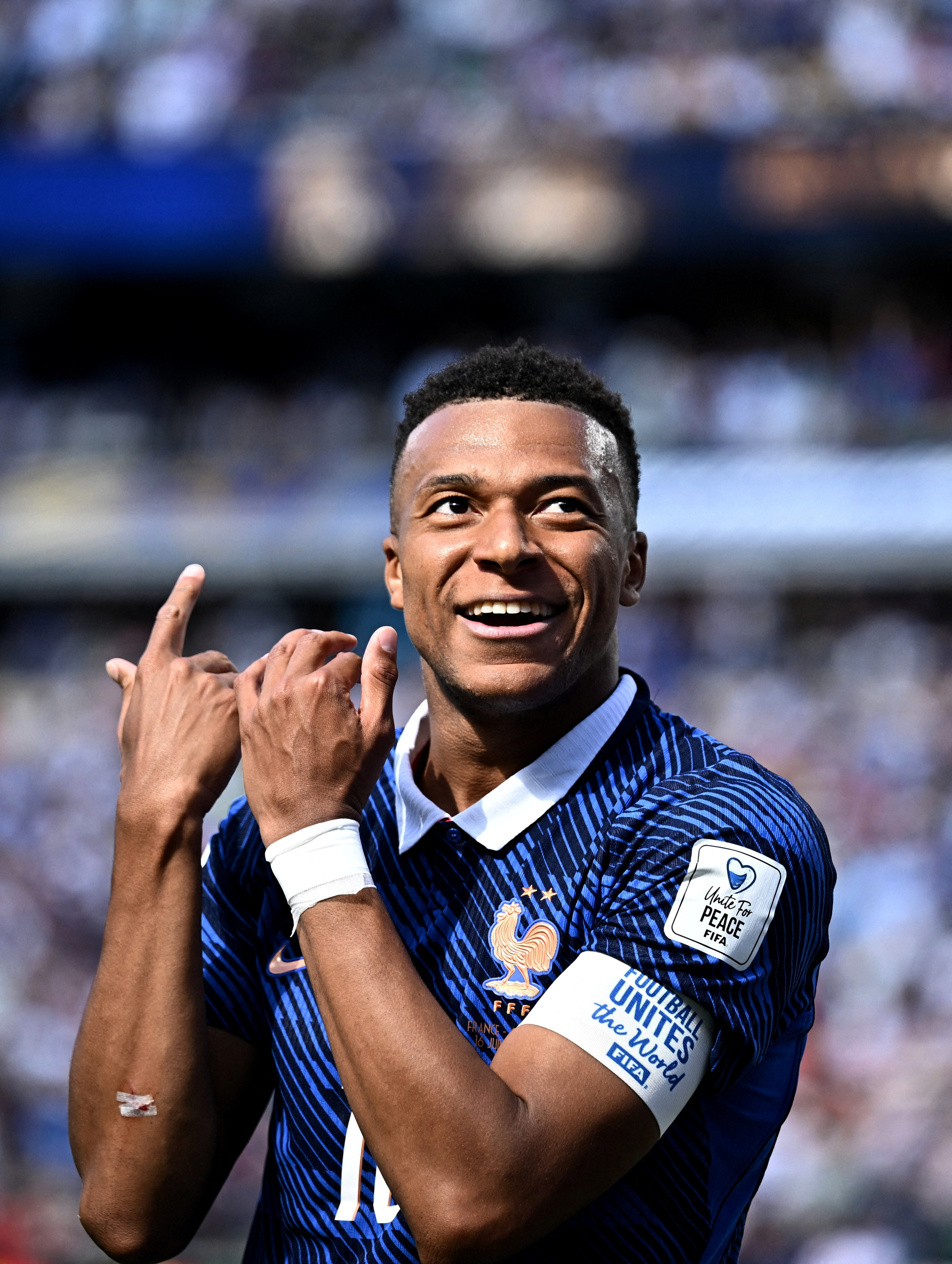 France’s Kylian Mbappe celebrates scoring their first goal against Senegal