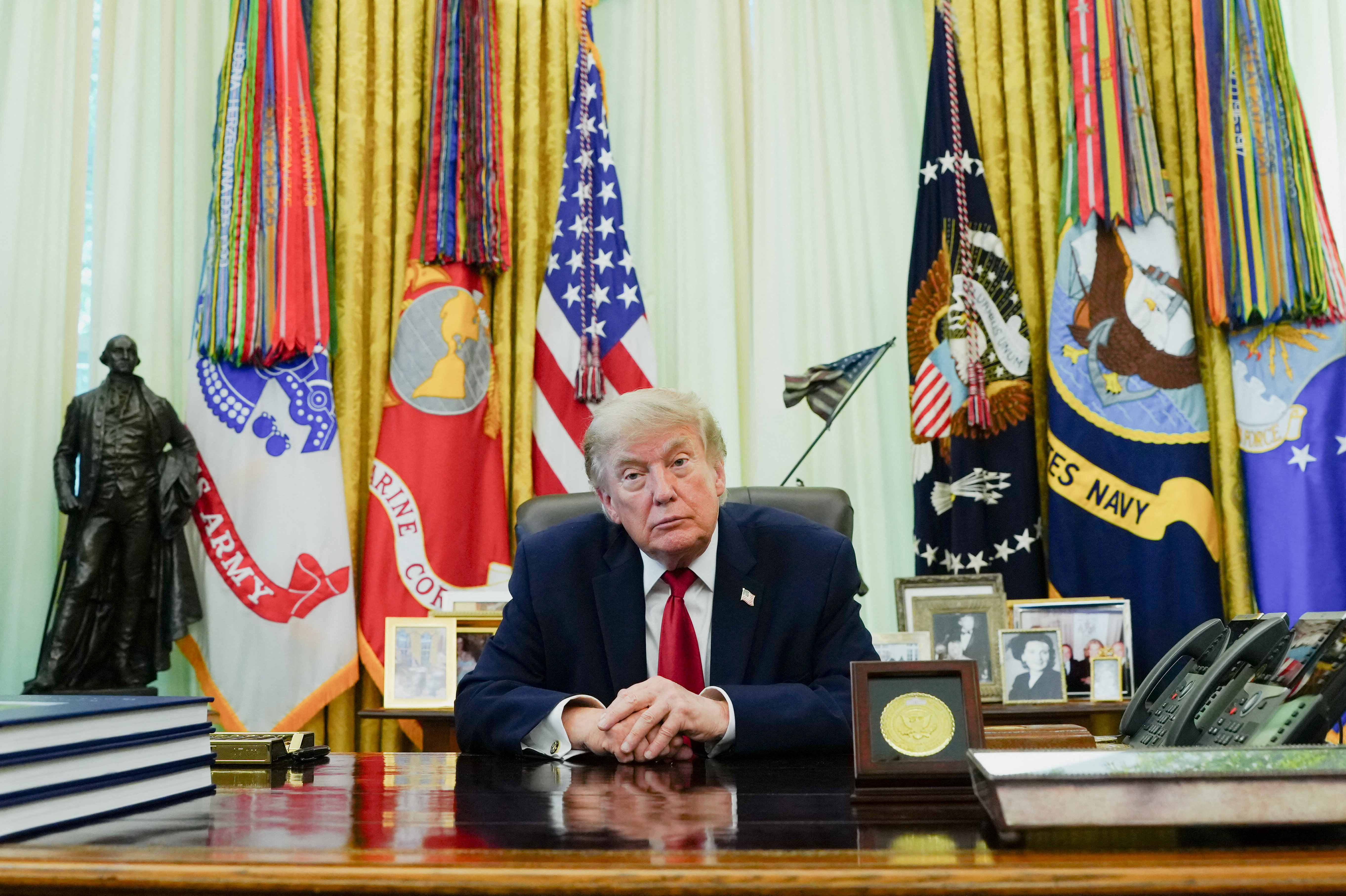U.S. President Donald Trump looks on on the day he signs an executive order on vehicle repairs in the Oval Office at the White House in Washington, D.C., U.S., June 29, 2026. REUTERS/Aaron Schwartz