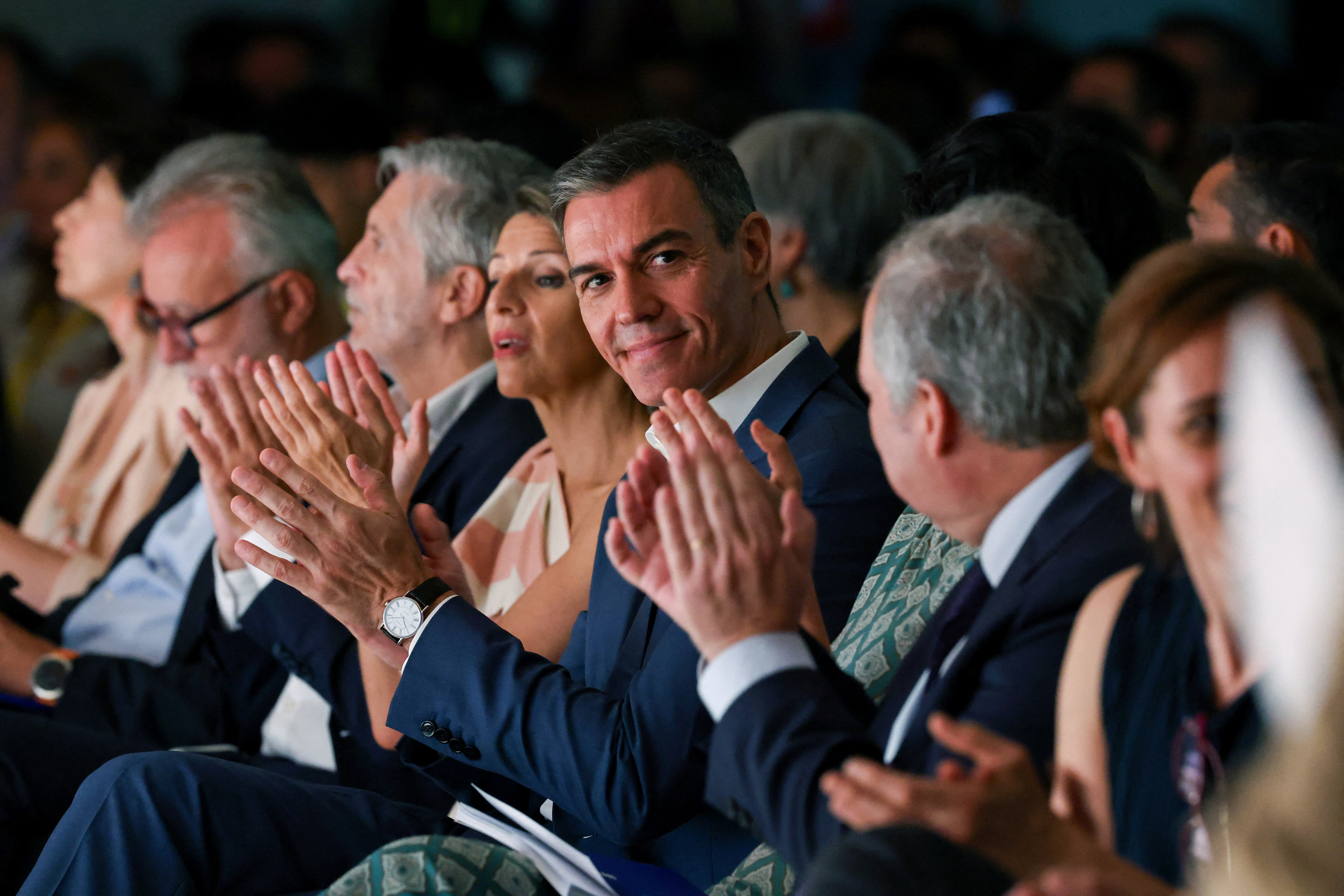 Spanish Prime Minister Pedro Sanchez applauds, on the day he presents the citizenship and integration plan alongisde other ministers of his government, as the application window for the migration amnesty closes, in Madrid, Spain, June 30, 2026. REUTERS/Violeta Santos Moura