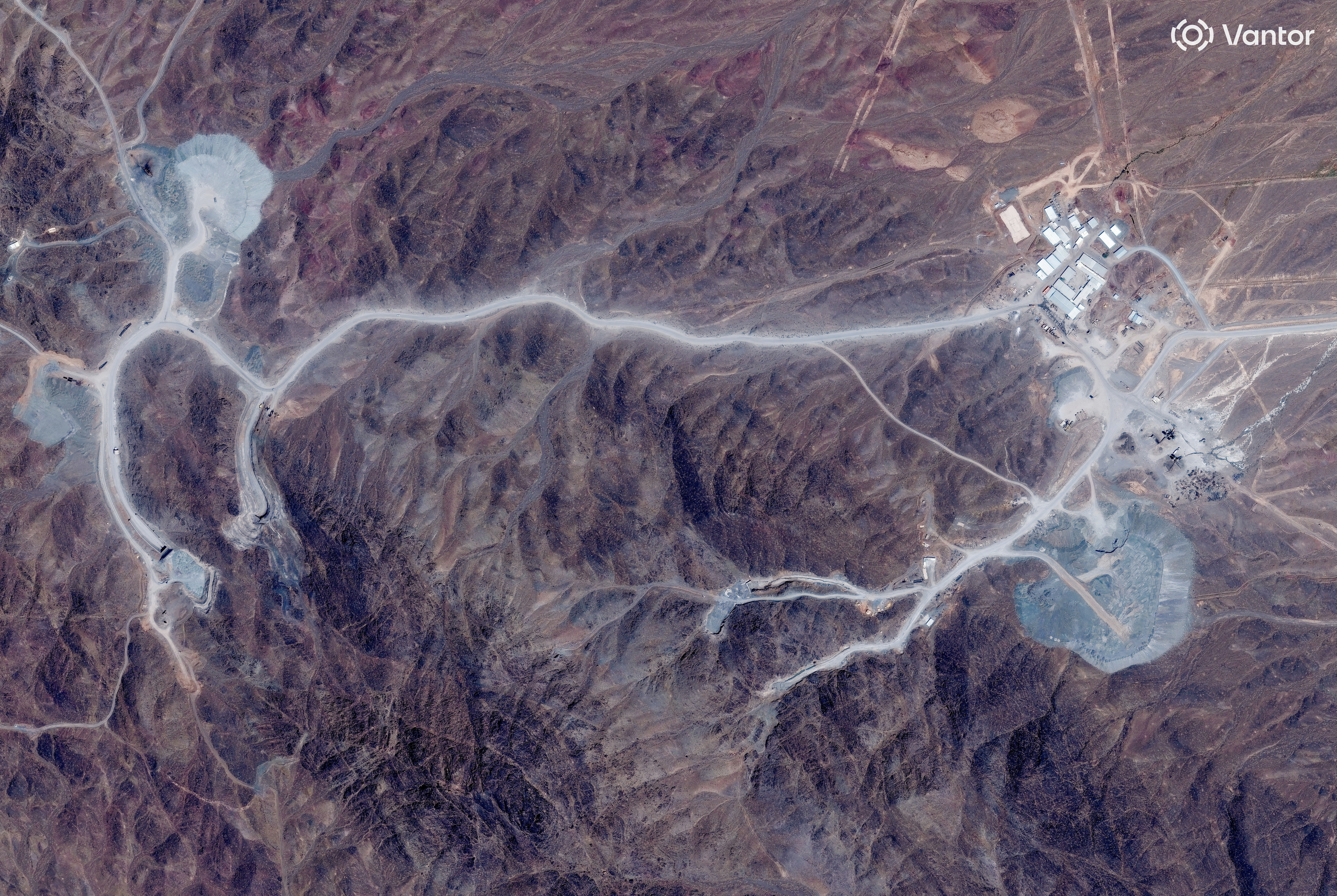 A satellite image of tunnel entrances in a mountainous area