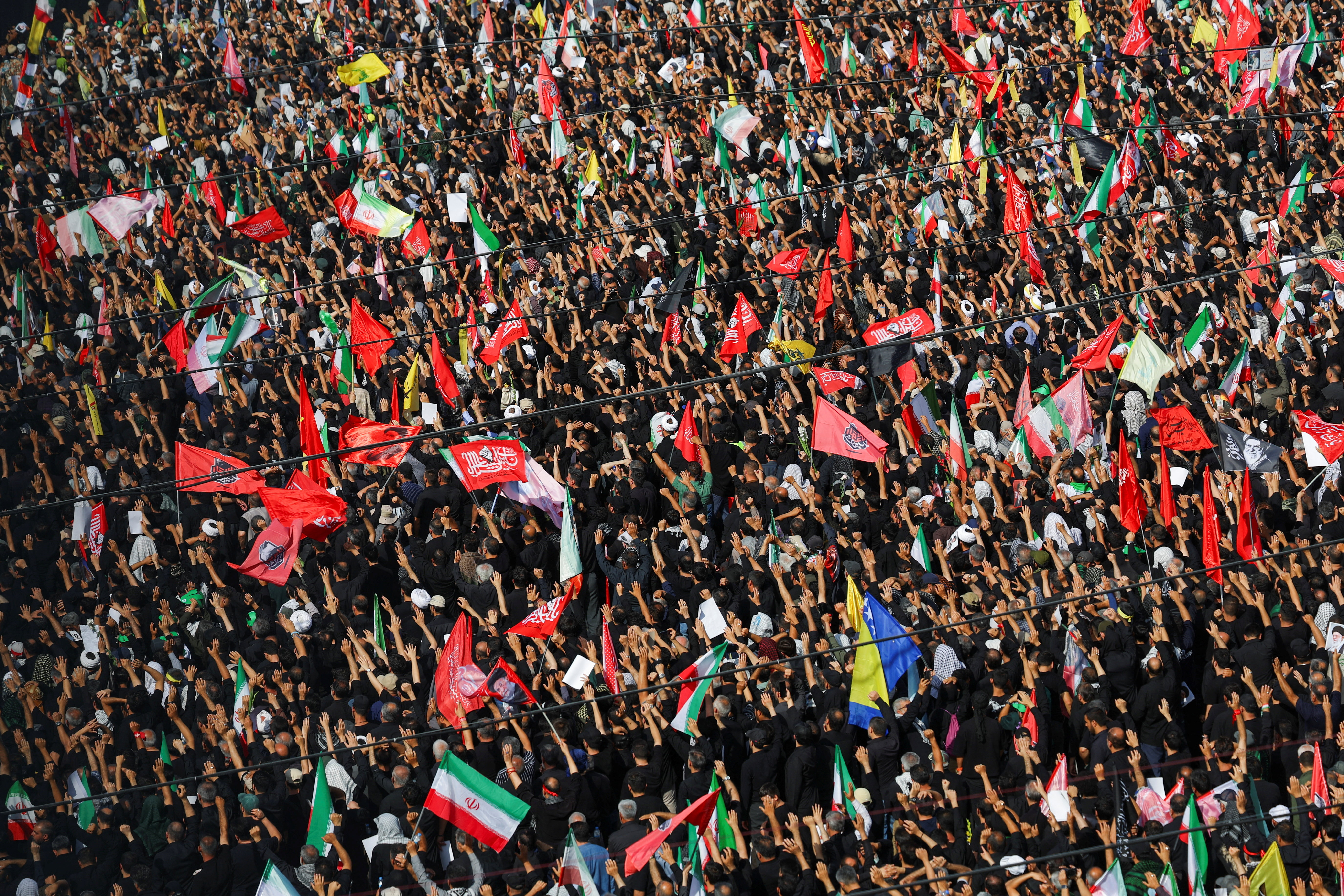 Millions mourn Khamenei in Tehran amid historic funeral procession