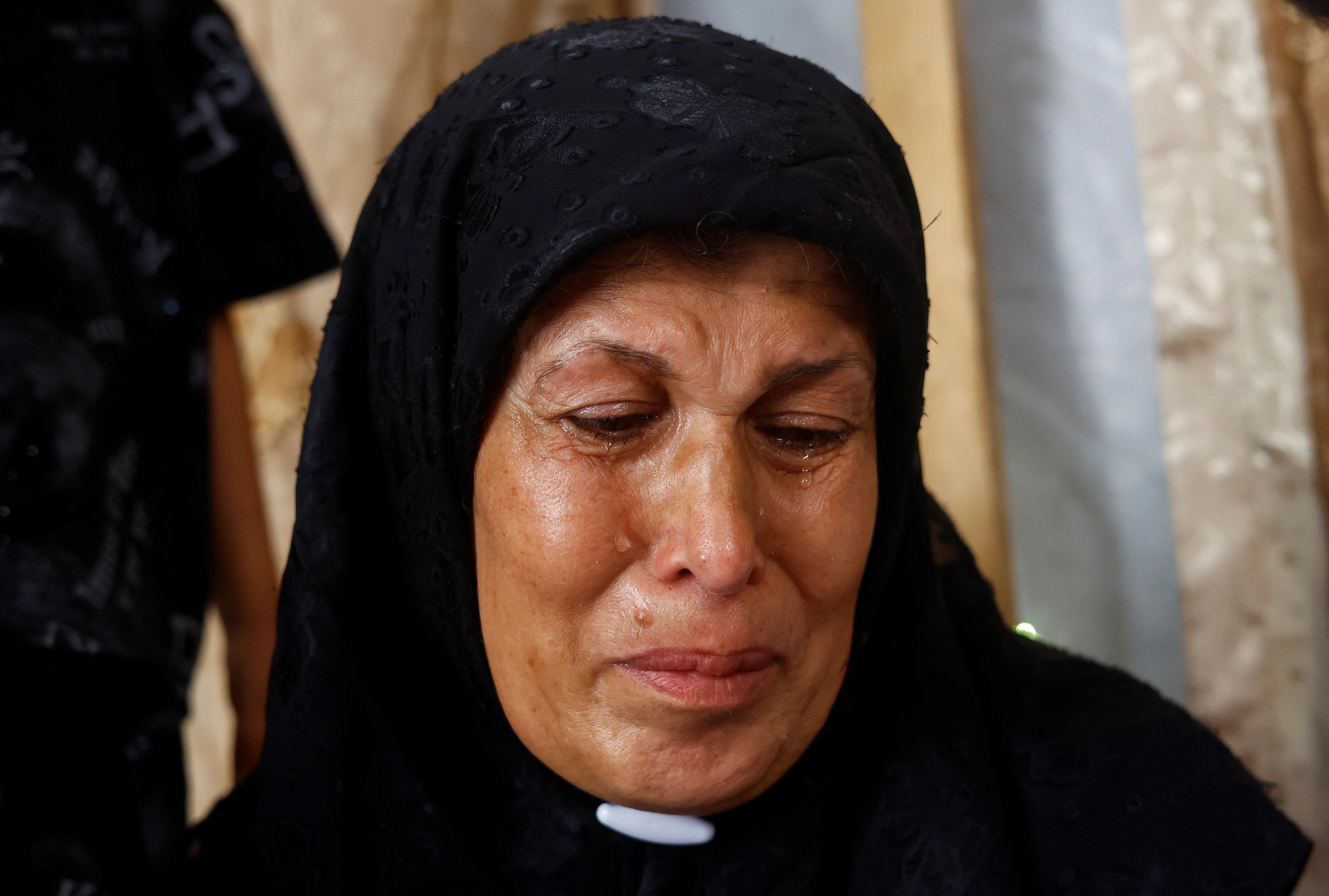 Joudeh Al-Ghoul, mother of Palestinian prisoner Ameen Al-Ghoul who is held by Israel, reacts in Gaza City, July 4, 2026. REUTERS/Mahmoud Issa