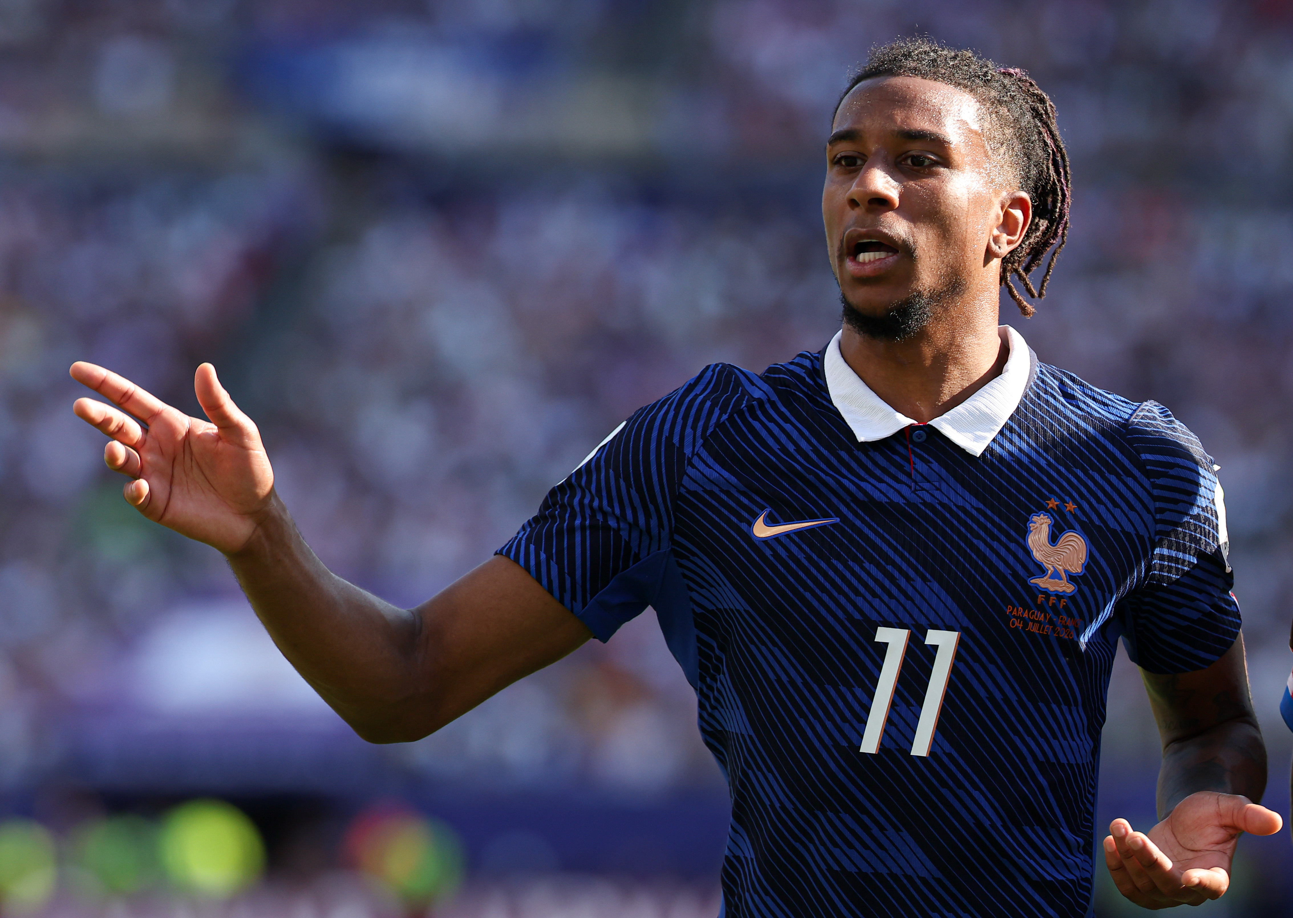 Michael Olise in action against Paraguay