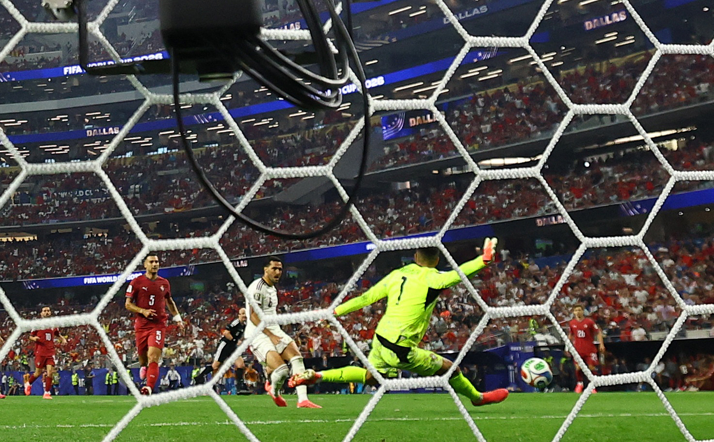 Spain's Mikel Merino scores their first goal