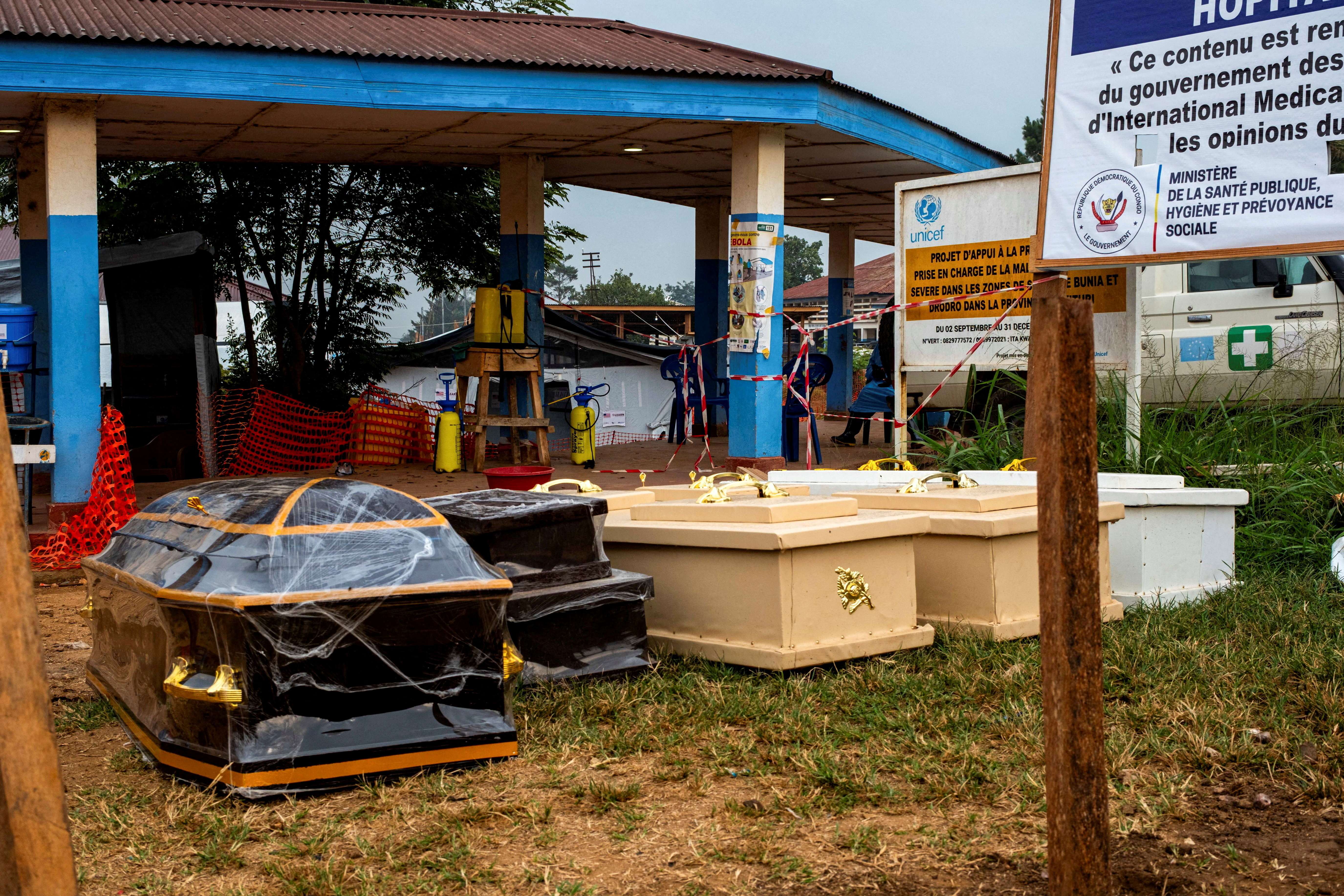 Caskets on the ground outside the Rwampara General Hospital [FILE: Gradel Muyisa Mumbere/Reuters]