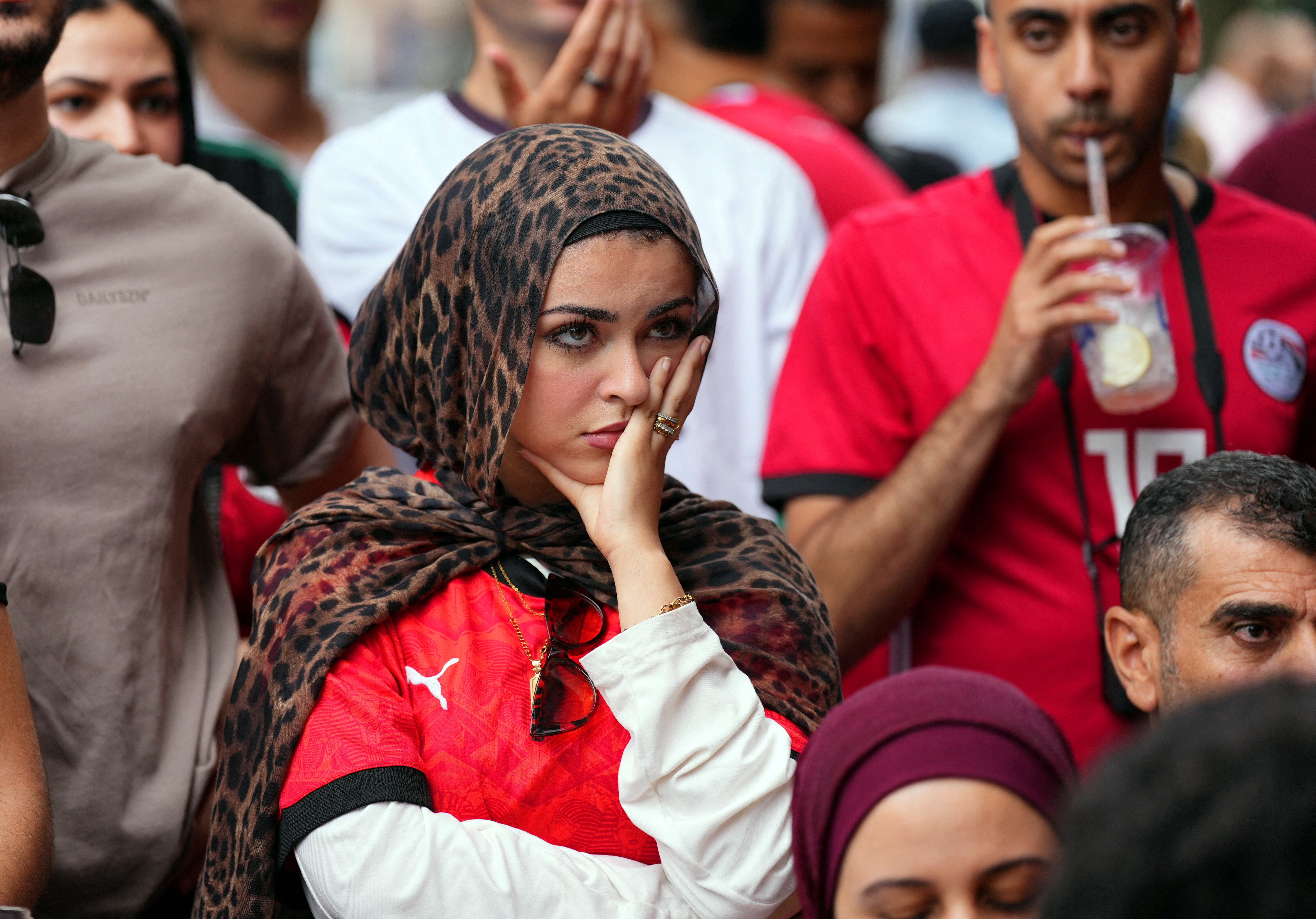 Egypt fan reacts as she watches the match in New York City [Adam Gray/Reuters]