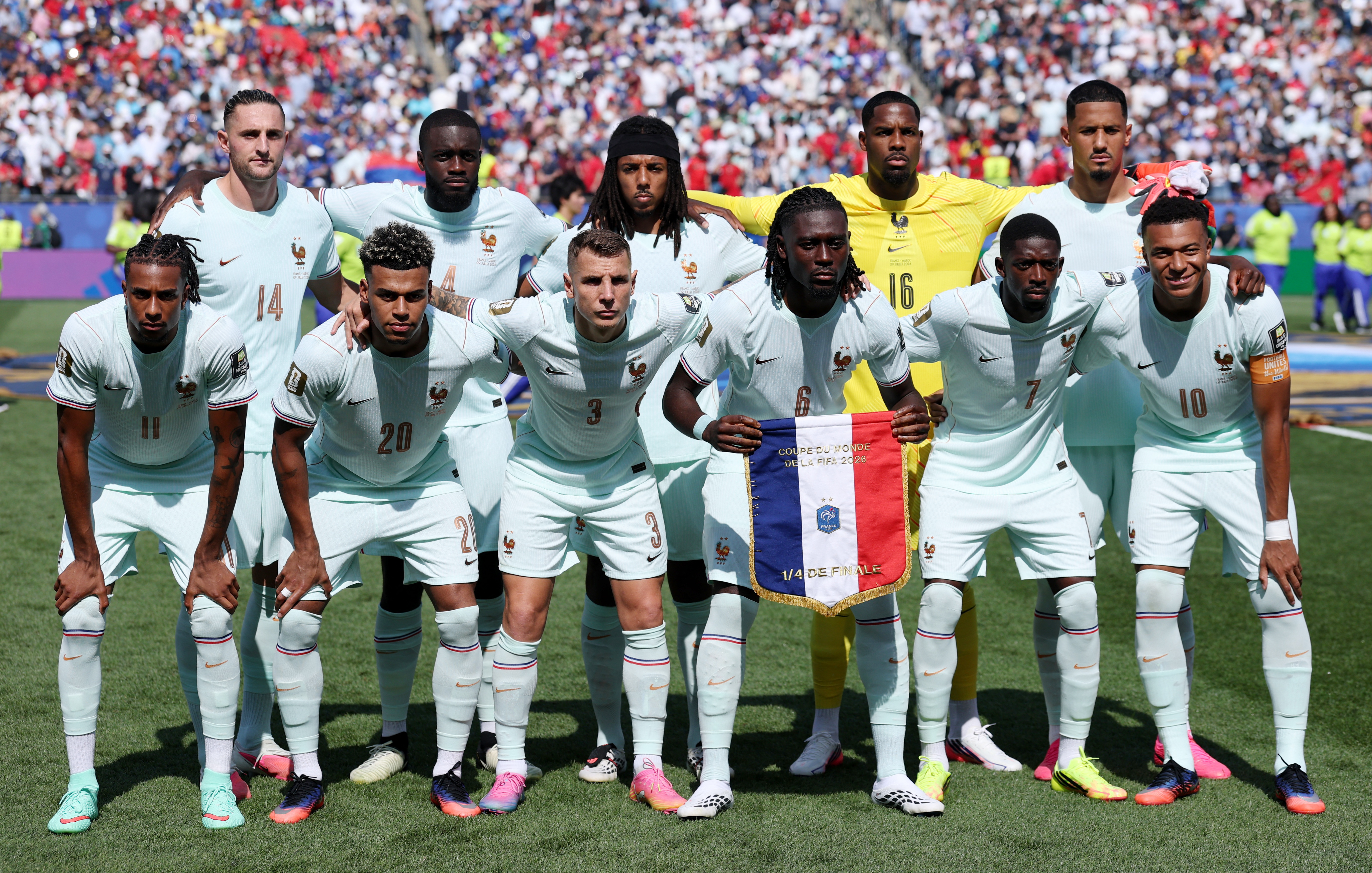 France players pose for a team group photo before the match