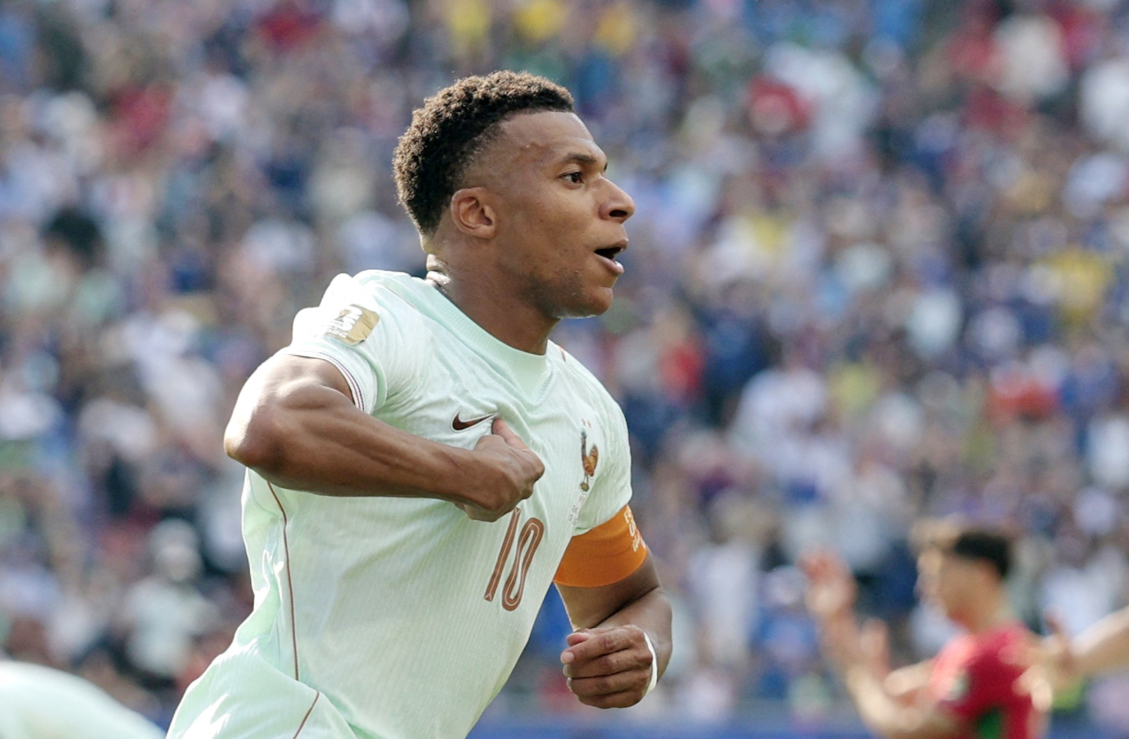 France's Kylian Mbappe celebrates scoring their first goal