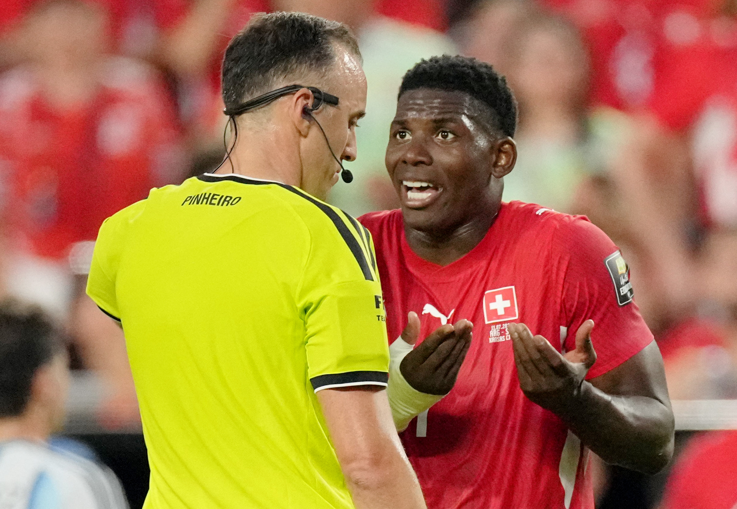 Soccer Football - FIFA World Cup 2026 - Quarter Final - Argentina v Switzerland - Kansas City Stadium, Kansas City, Missouri, U.S. - July 11, 2026 Switzerland's Breel Embolo remonstrates with referee Joao Pedro Silva Pinheiro IMAGN IMAGES via Reuters/Denny Medley
