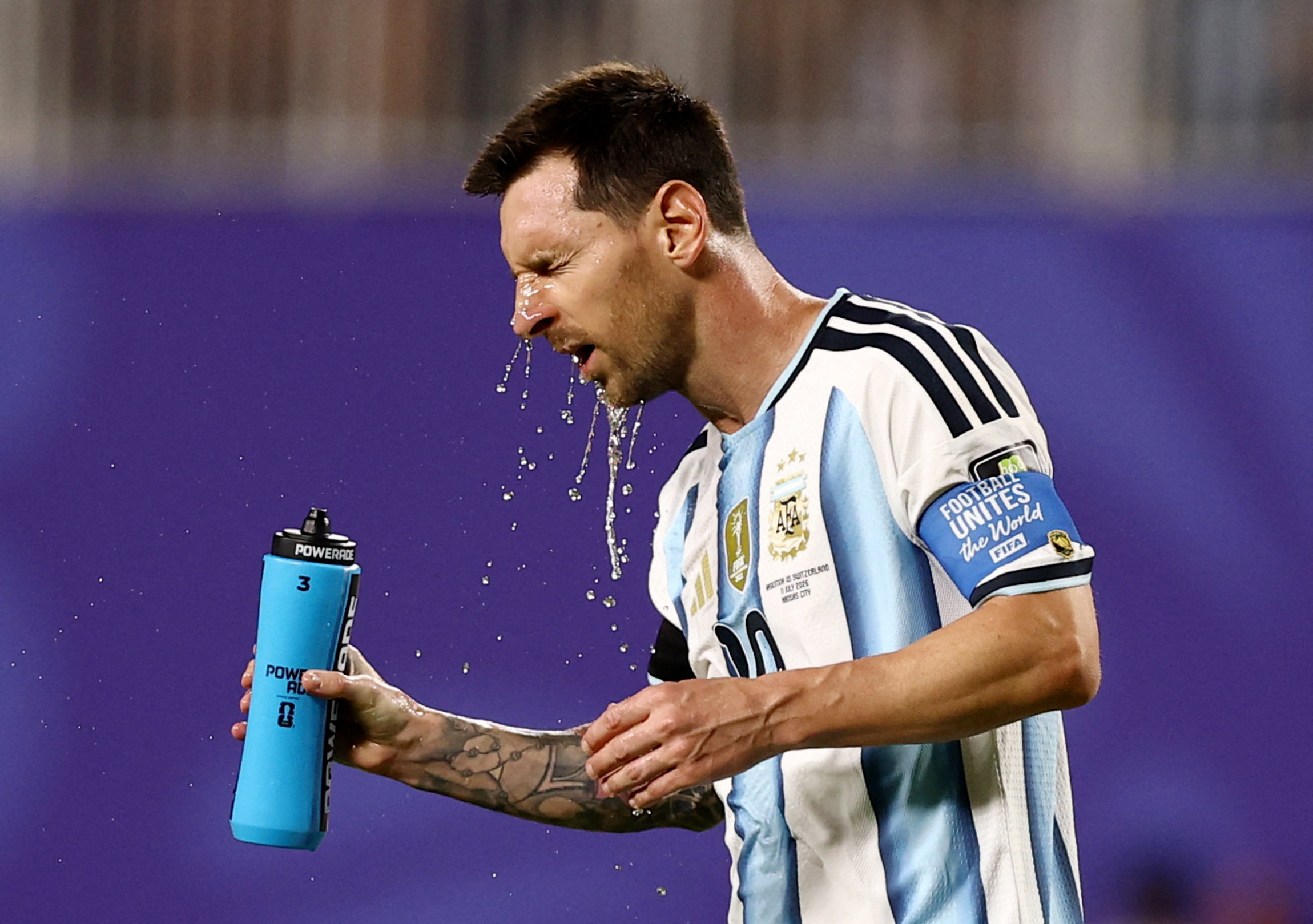 Argentina’s Lionel Messi takes a break during the quarterfinal