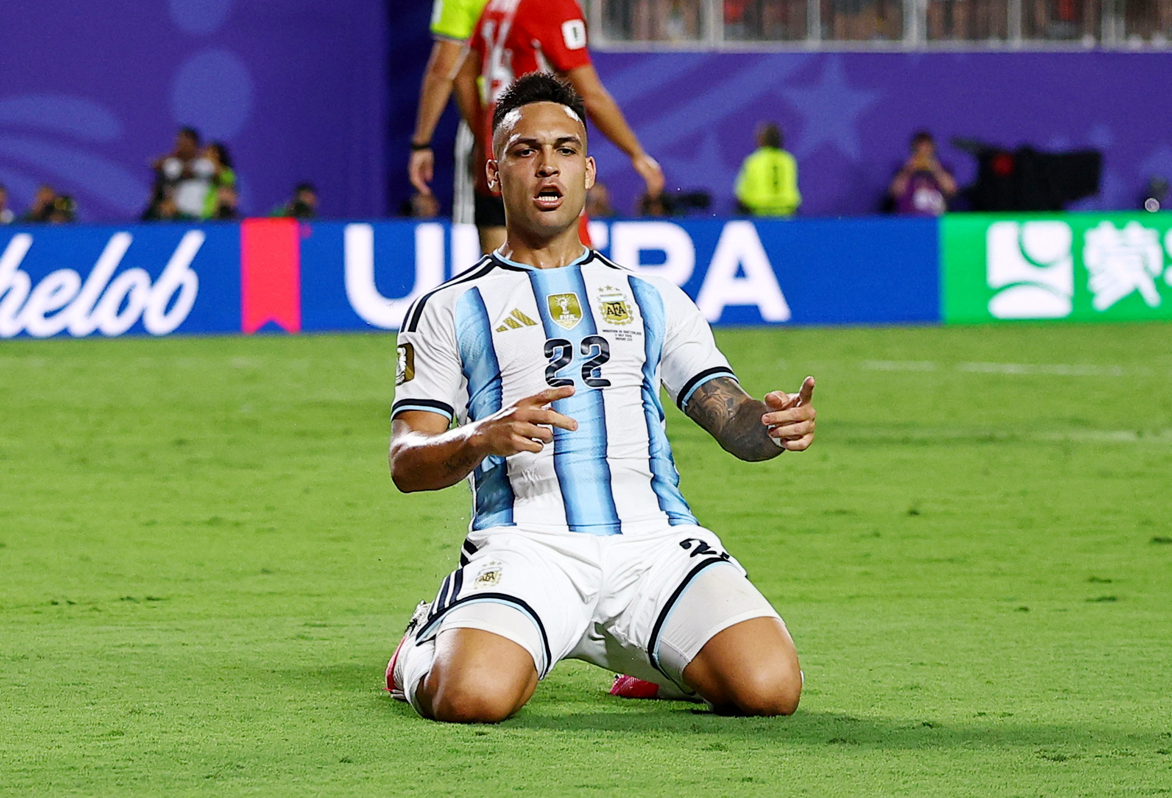 Argentina’s Lautaro Martinez celebrates scoring their third goal against Switzerland
