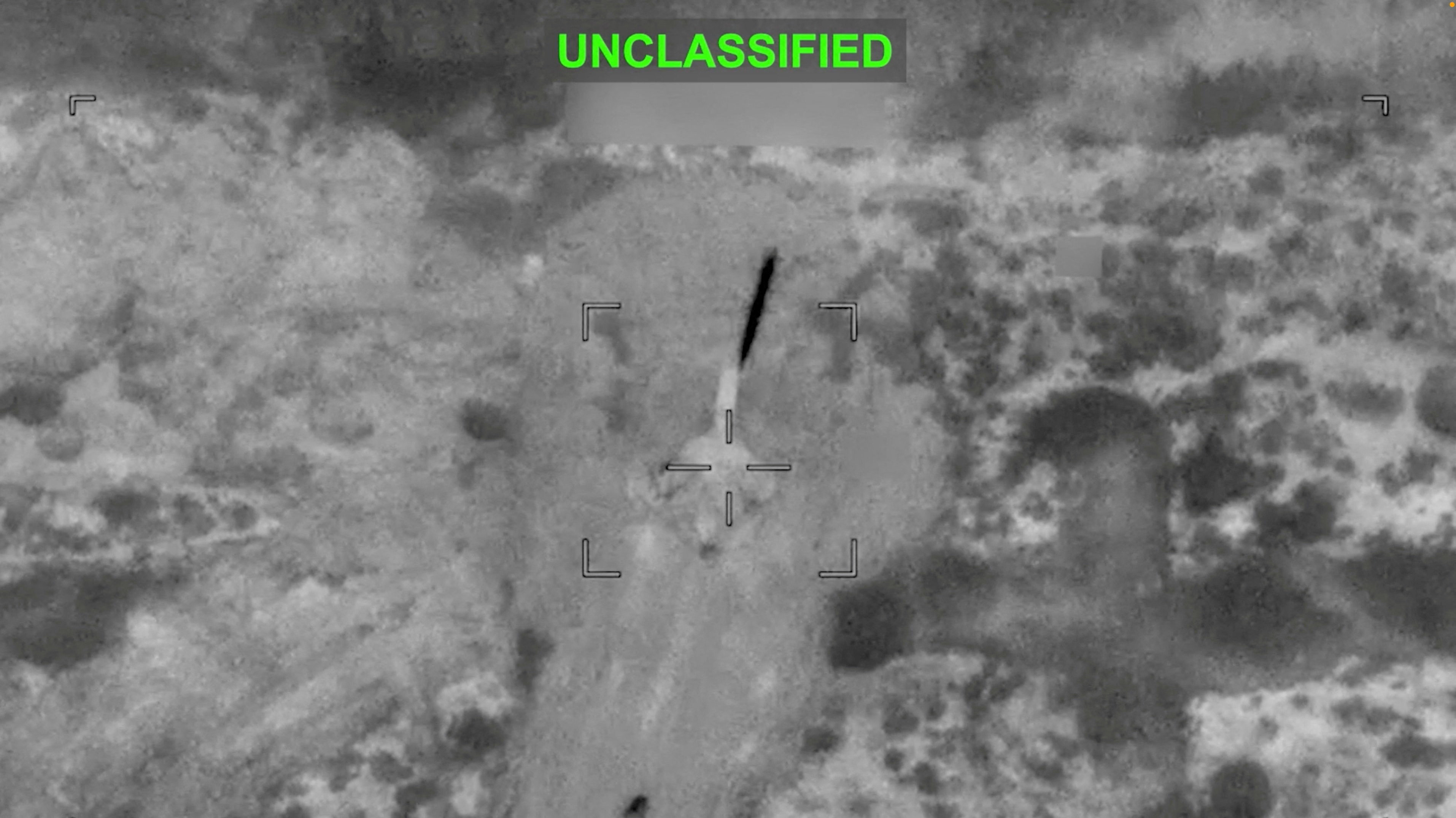 A projectile approaches a target at an unknown location, during what U.S. Central Command (CENTCOM) says are strikes on Iran, in this screen grab taken from a handout video released on July 12, 2026. U.S. Central Command/Handout via REUTERS THIS IMAGE HAS BEEN SUPPLIED BY A THIRD PARTY. MANDATORY CREDIT. OVERLAY AND MASKING AT SOURCE. VERIFICATION: - Reuters was not able to independently verify the location and the date when the video was filmed. - No earlier version of the video found posted online before July 12. REFILE - CORRECTING TIMELINE OF THE STRIKES