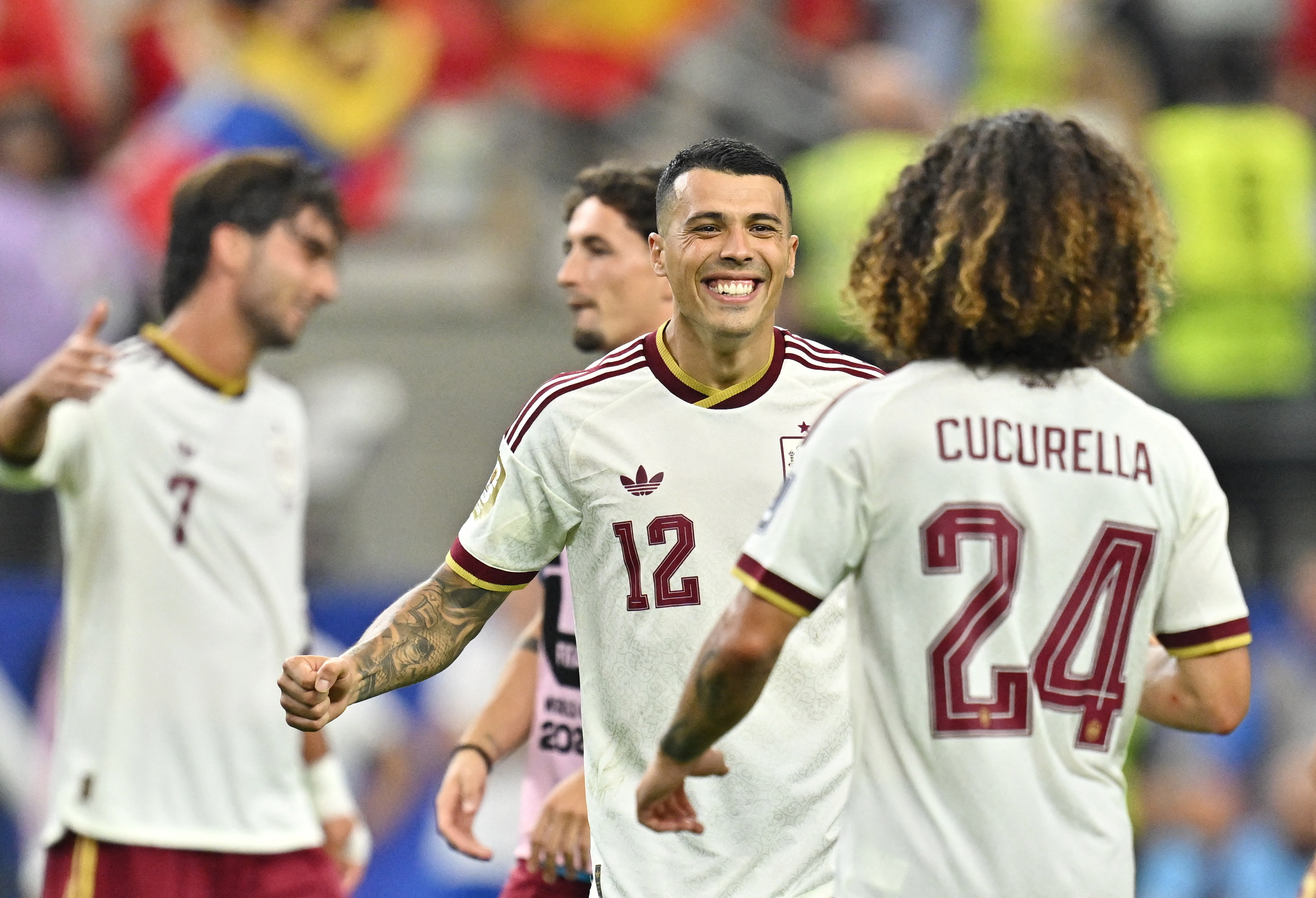 Spain’s Pedro Porro and Marc Cucurella celebrate after the match
