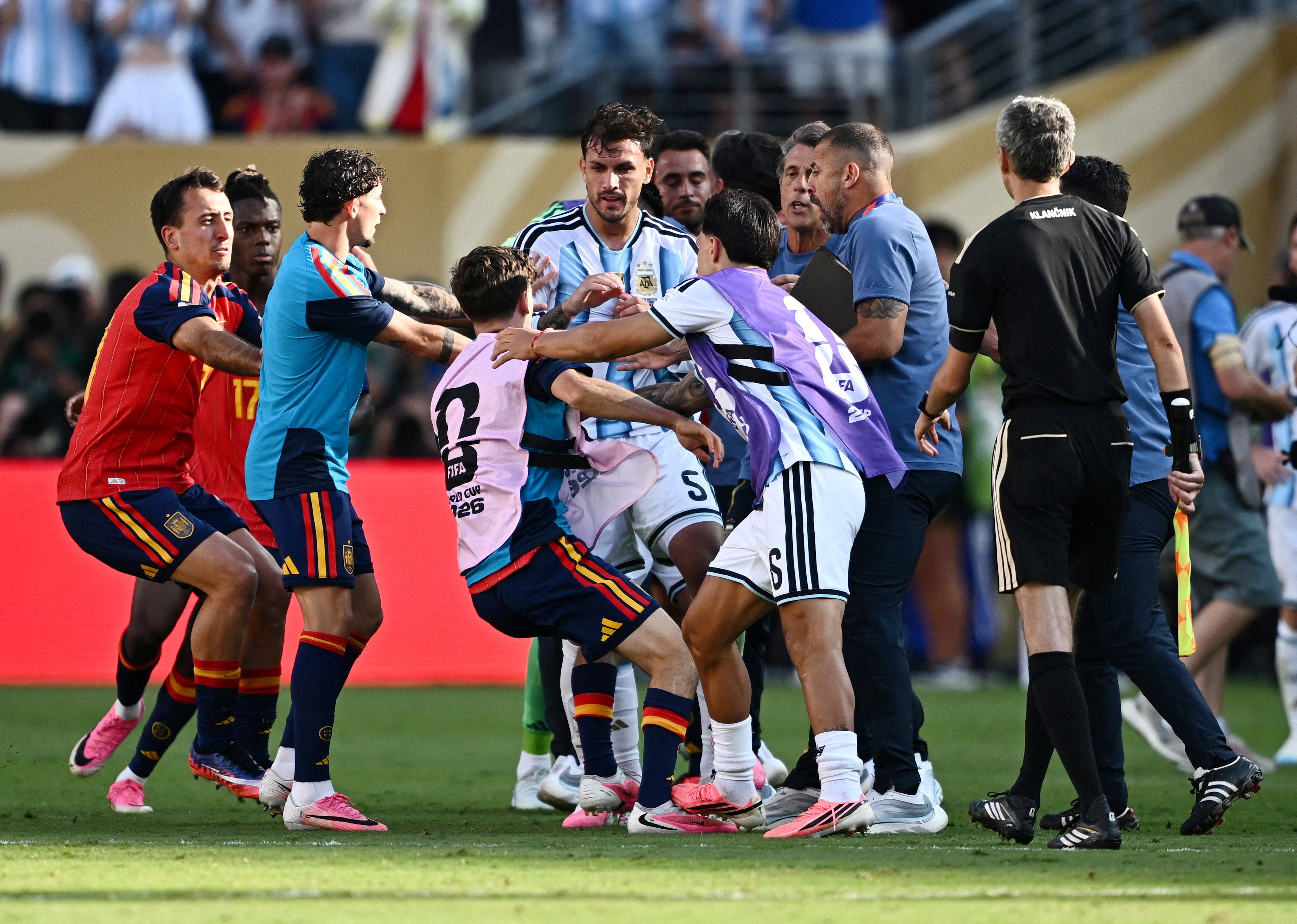 Soccer Football - FIFA World Cup 2026 - Final - Spain v Argentina - New York/New Jersey Stadium, East Rutherford, New Jersey, U.S. - July 19, 2026 Argentina's Leandro Paredes and Lisandro Martinez clash with Spain's Gavi after the match REUTERS/Dylan Martinez REFILE - CORRECTING ID