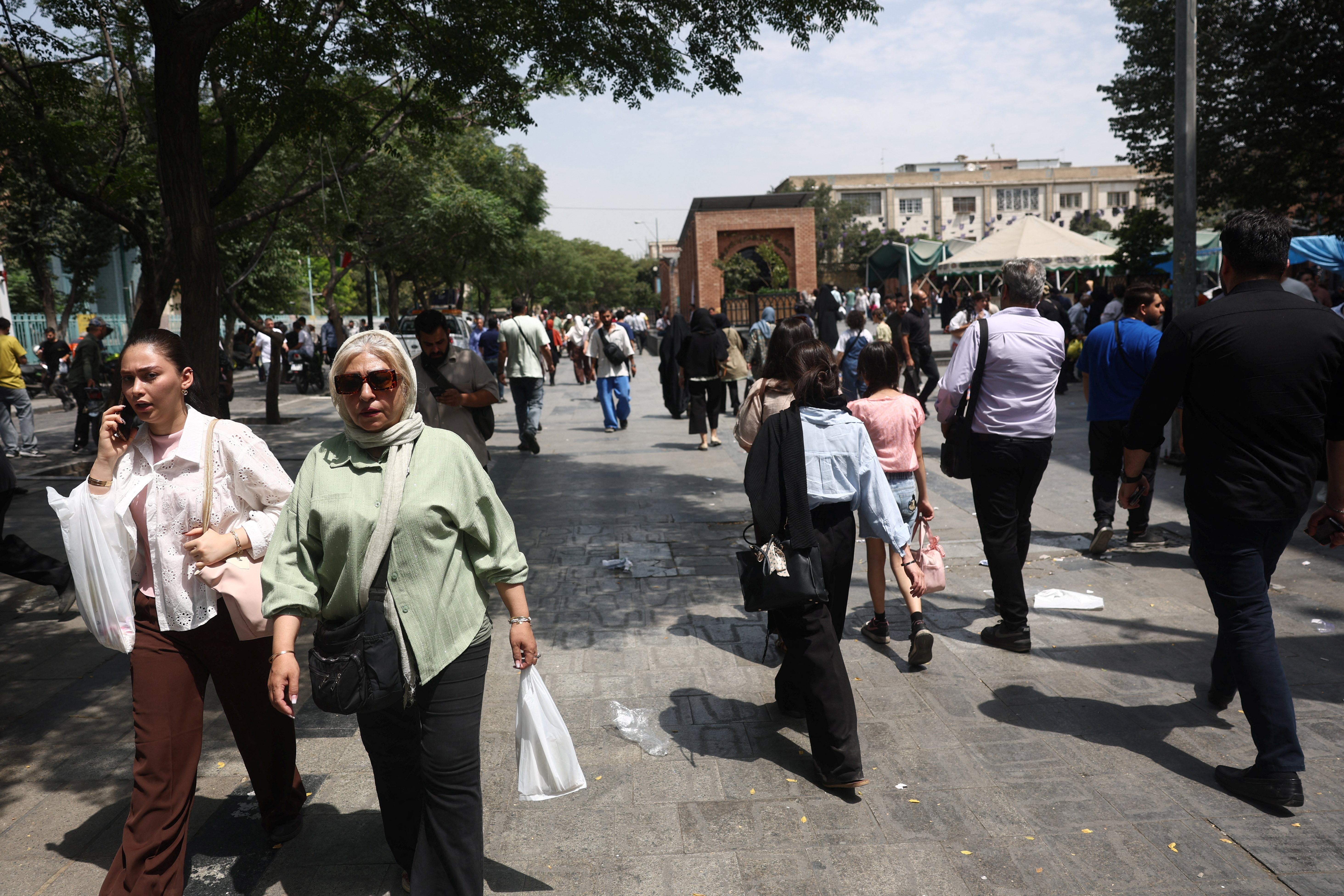 People walk in the Grand Bazaar in Tehran, Iran, July 20, 2026. Majid Asgaripour/WANA (West Asia News Agency) via REUTERS ATTENTION EDITORS - THIS PICTURE WAS PROVIDED BY A THIRD PARTY. ISRAEL OUT. NO COMMERCIAL OR EDITORIAL SALES IN ISRAEL. NO ACCESS FOR ISRAELI MEDIA. NO USE BBC PERSIAN. NO USE VOA PERSIAN. NO USE MANOTO. NO USE IRAN INTERNATIONAL. NO USE RADIO FARDA. DIGITAL: NO USE BBC PERSIAN. NO USE VOA PERSIAN. NO USE MANOTO. NO USE IRAN INTERNATIONAL. NO USE RADIO FARDA.
