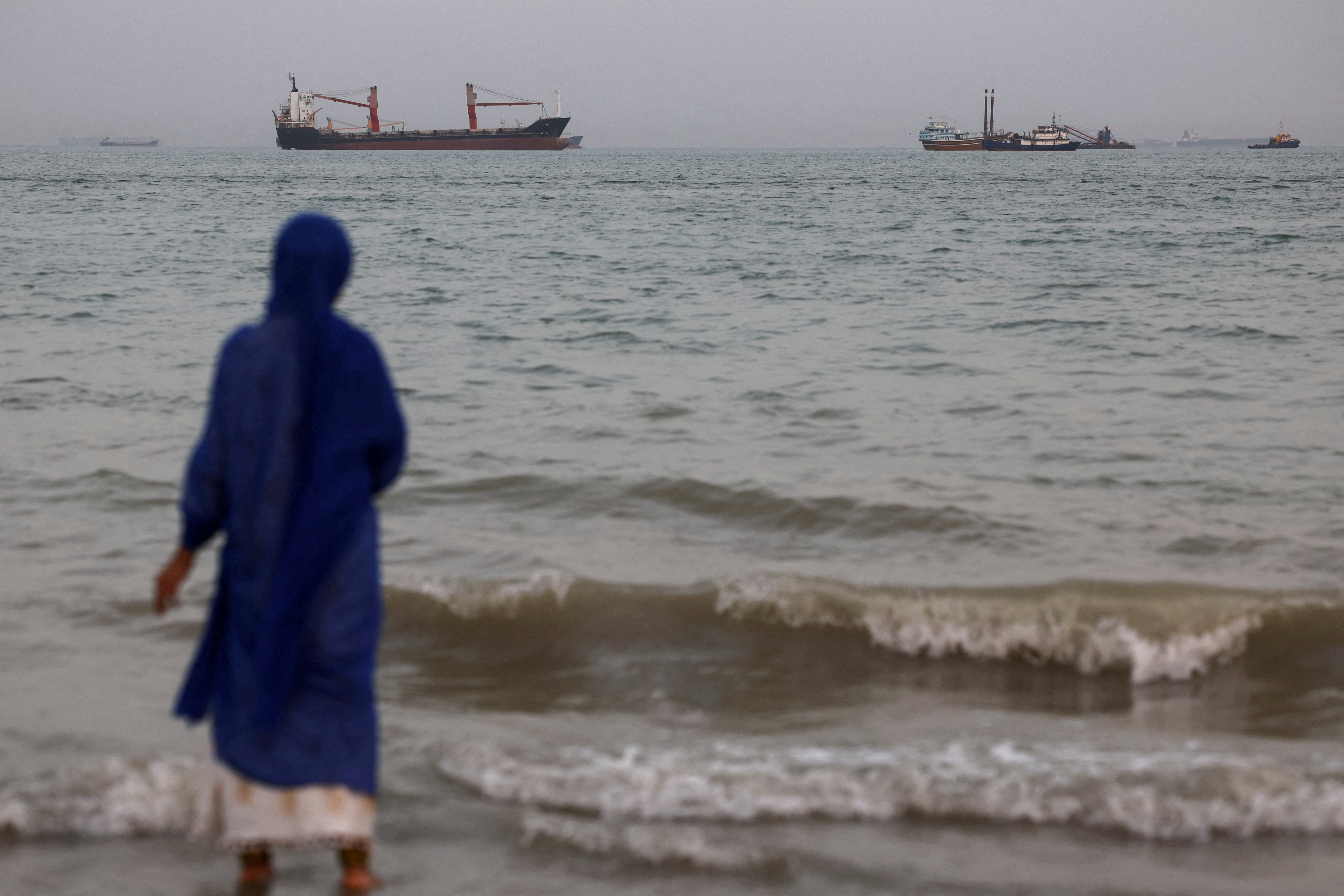 FILE PHOTO: Vessels in the Strait of Hormuz are visible near the beach of Bandar Abbas, Iran, May 22, 2026. Majid Asgaripour/WANA (West Asia News Agency) via REUTERS ATTENTION EDITORS - THIS PICTURE WAS PROVIDED BY A THIRD PARTY/File Photo