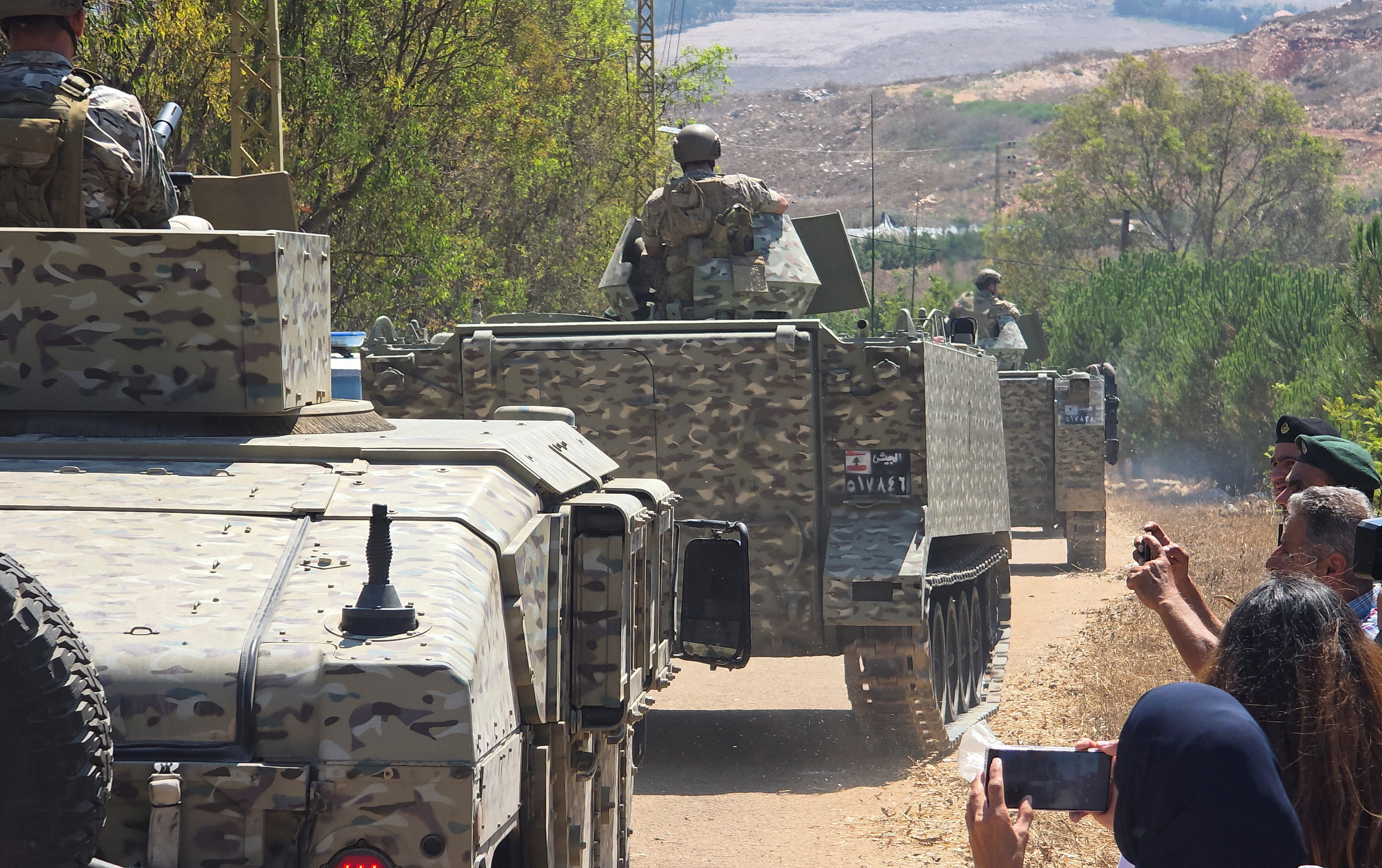 Lebanese army troops deploy at the entrance of the town of Zawtar al-Gharbiyeh after Israeli forces withdrew from the area