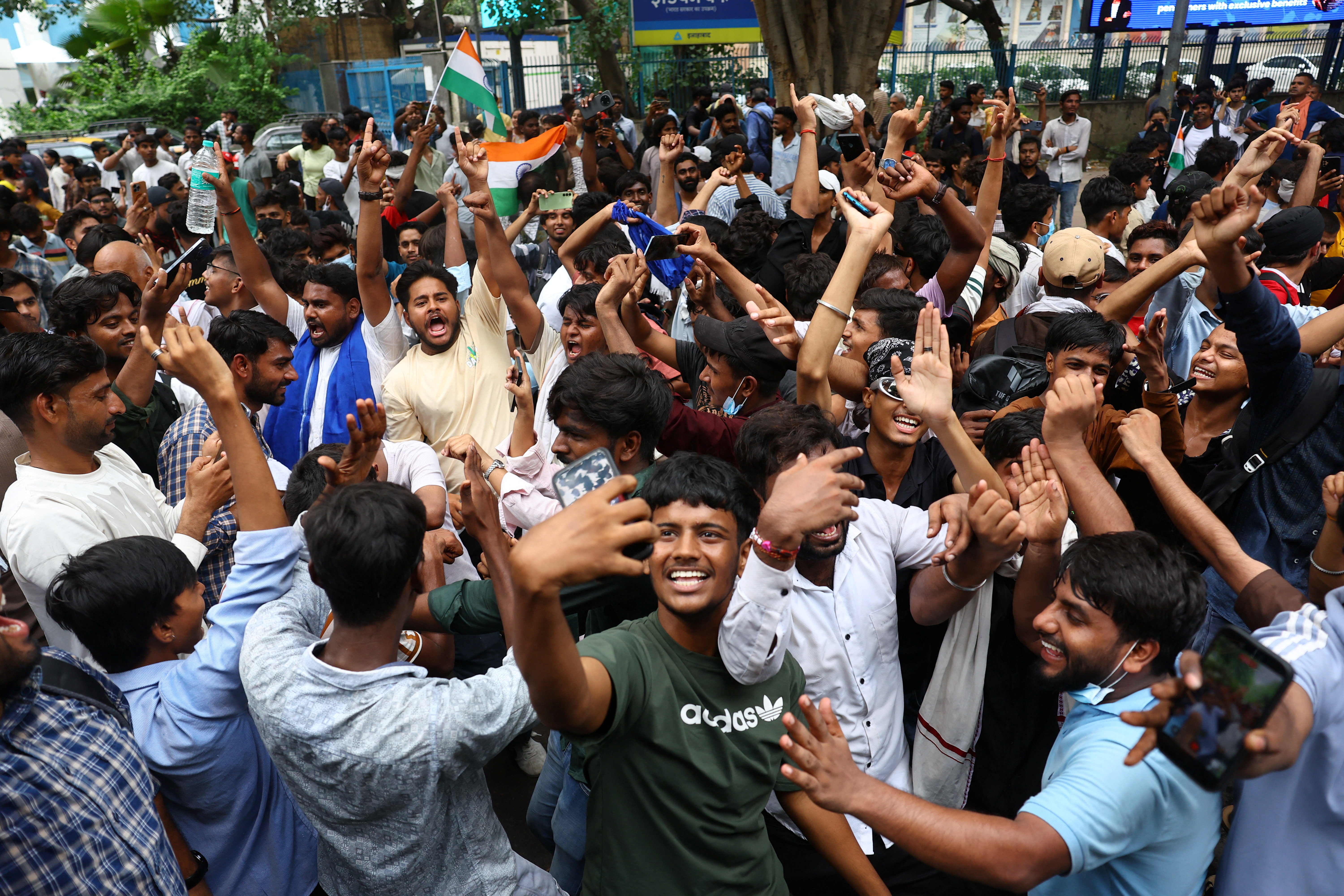 Supporters of India's Cockroach Janta Party (CJP) celebrate after India’s Education Minister Dharmendra Pradhan resigned following days of protests demanding his resignation over National Eligibility cum Entrance Test (NEET) examination paper leaks, at Jantar Mantar in New Delhi, July 25, 2026. REUTERS/Anushree Fadnavis