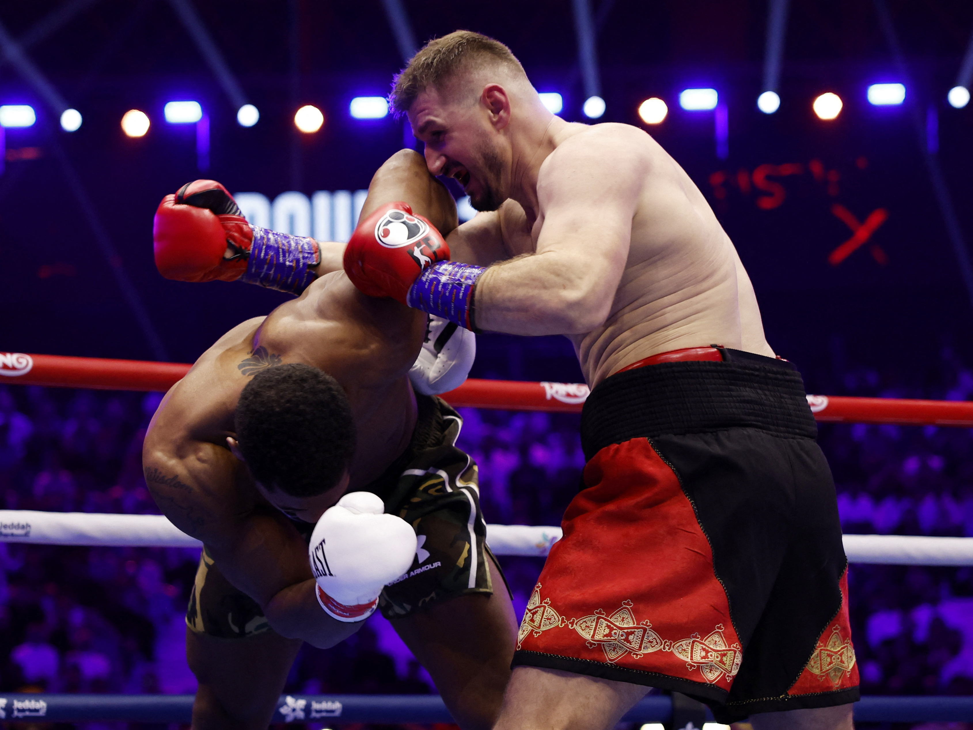 Boxing - The Comeback - Anthony Joshua v Kristian Prenga - Jeddah Superdome, Jeddah, Saudi Arabia - July 26, 2026 Kristian Prenga in action with Anthony Joshua during their heavyweight fight REUTERS/Ibraheem Abu Mustafa