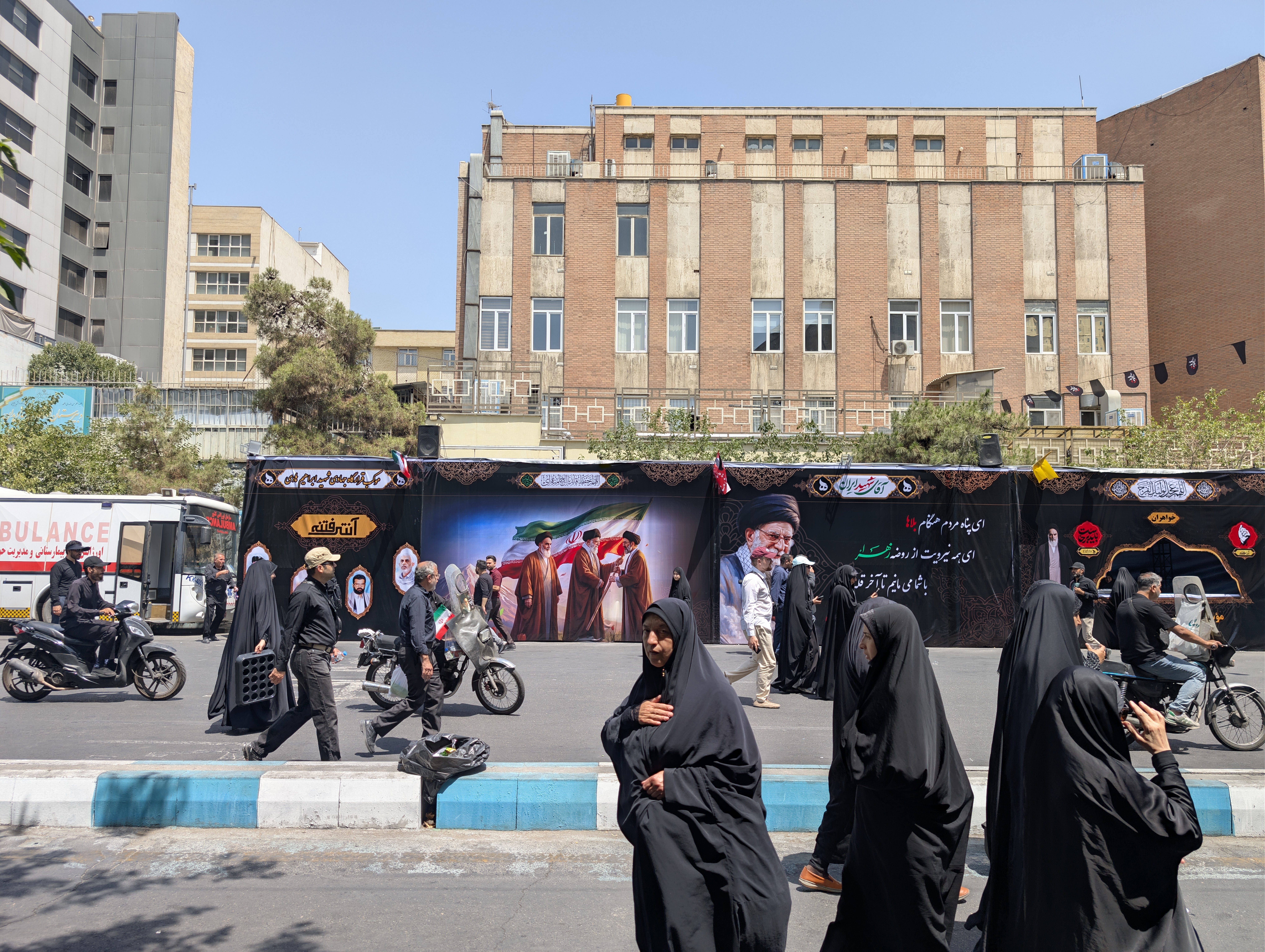 Government messages and images of Khamenei were plastered across Tehran during the commemoration [Maziar Motamedi/Al Jazeera]