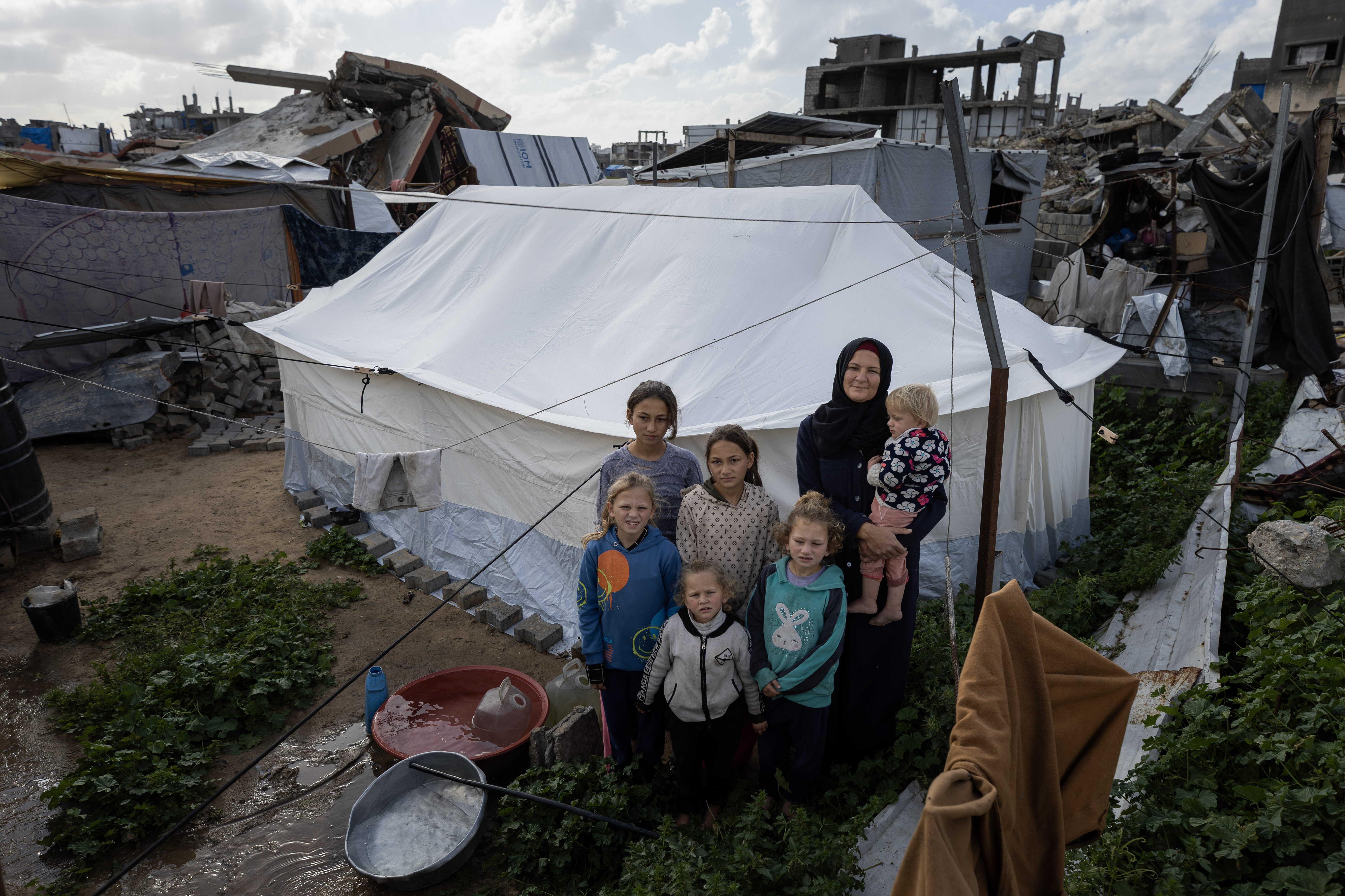 “It’s not easy being both a mother and father to a large family, but I have no choice but to continue, for the sake of my children,” says Amina Saadallah. Amina, a mother of six, lost her husband at the beginning of the war. She now lives with her children in a cloth tent that offers little protection from the seasons, especially extreme heat or cold.