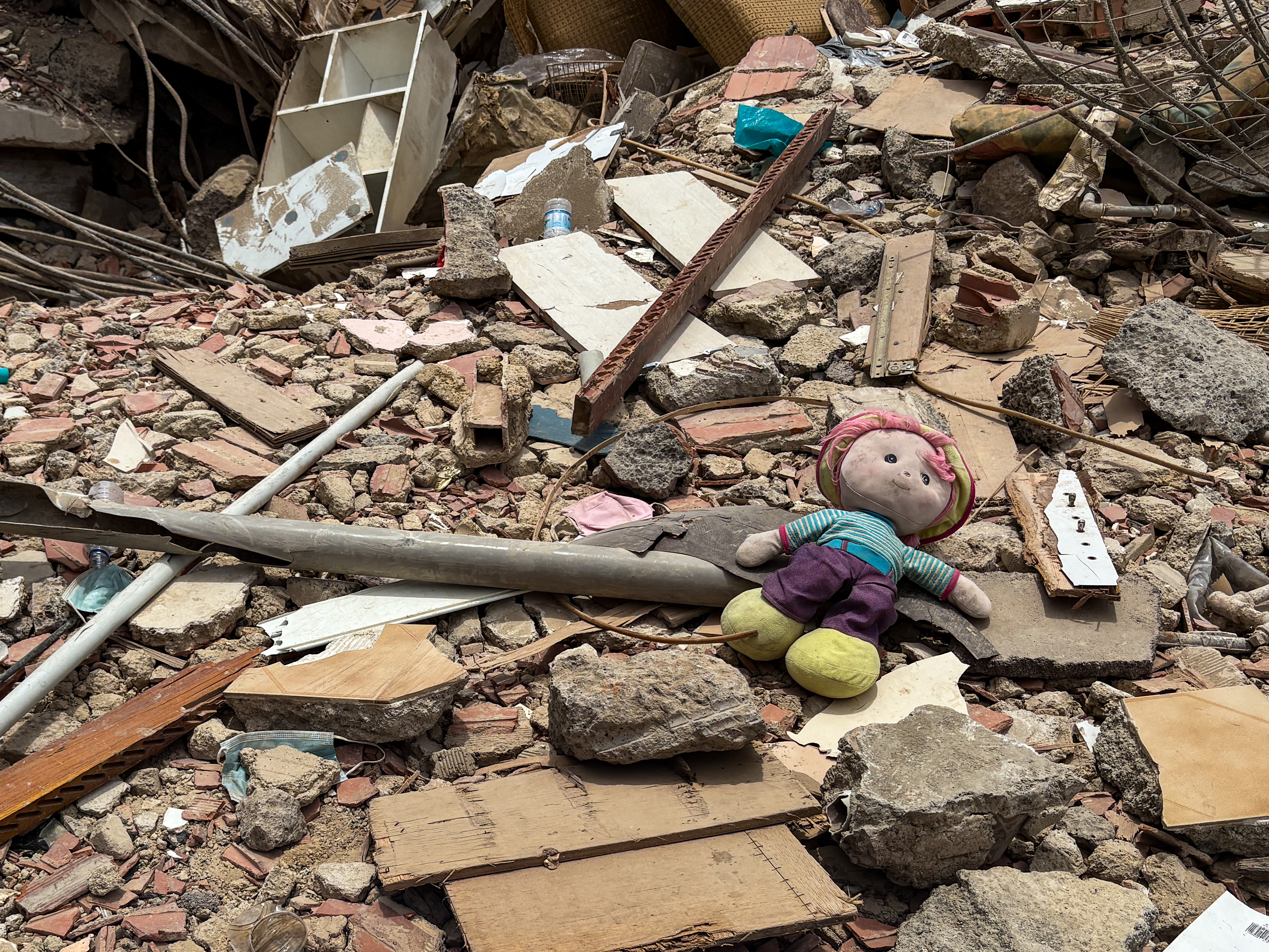A teddy bear lies in the Venezuela earthquake rubble