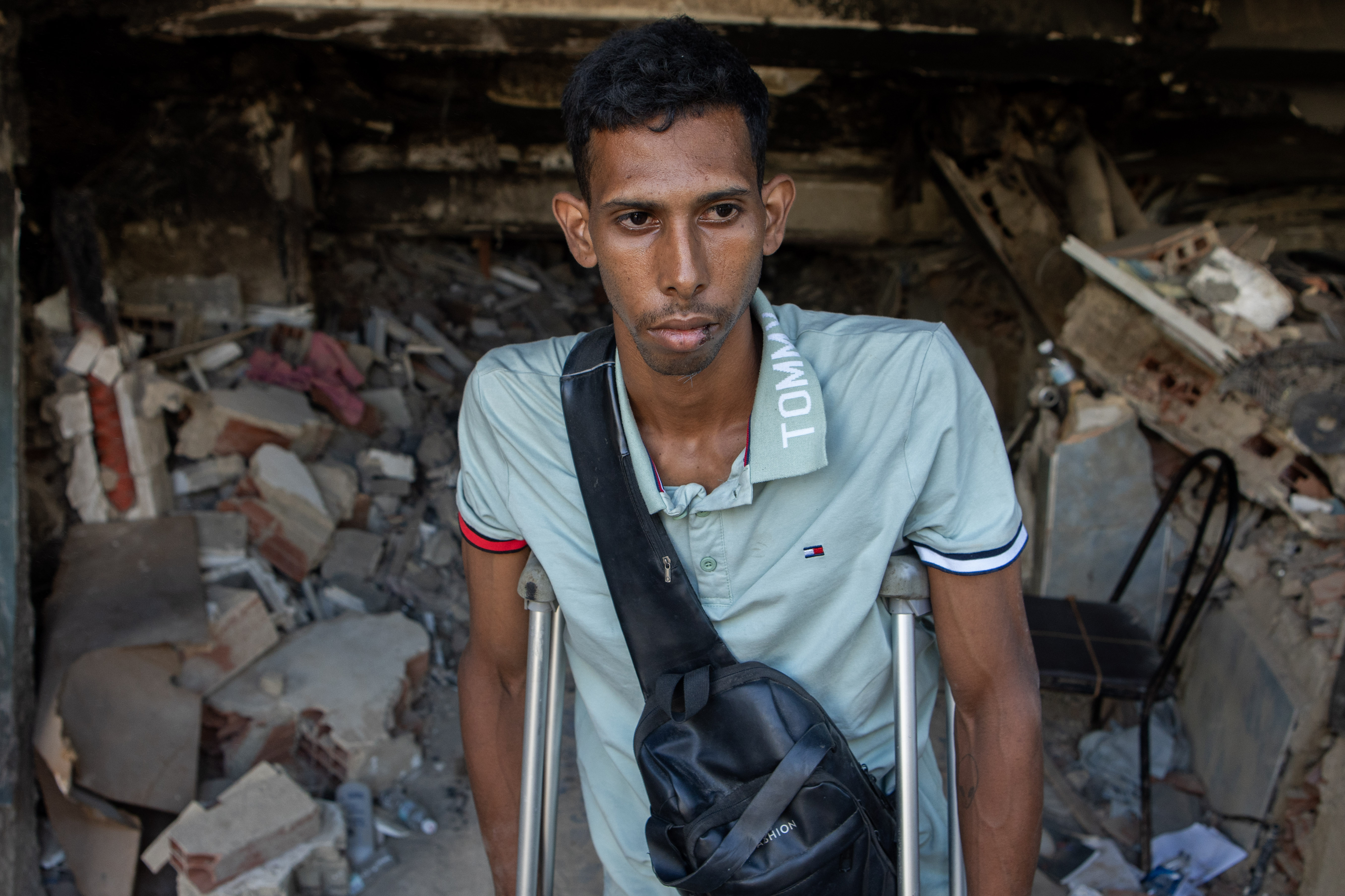 Noel Marquez continues to search for his family despite being on crutches