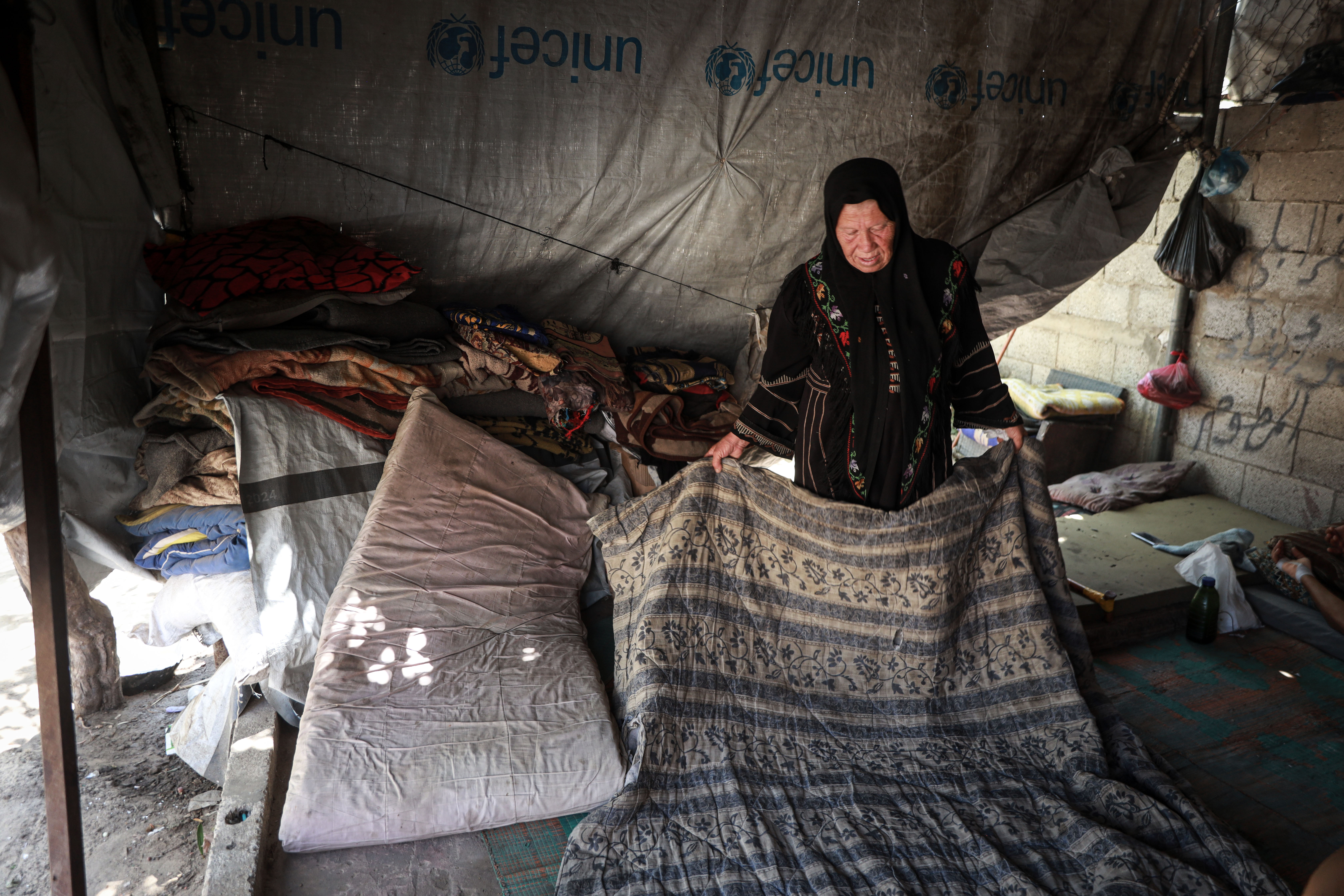 Suad says younger mothers need guidance in raising their children, especially as war has deeply changed family life [Abdelhakim Abu Riash/Al Jazeera]