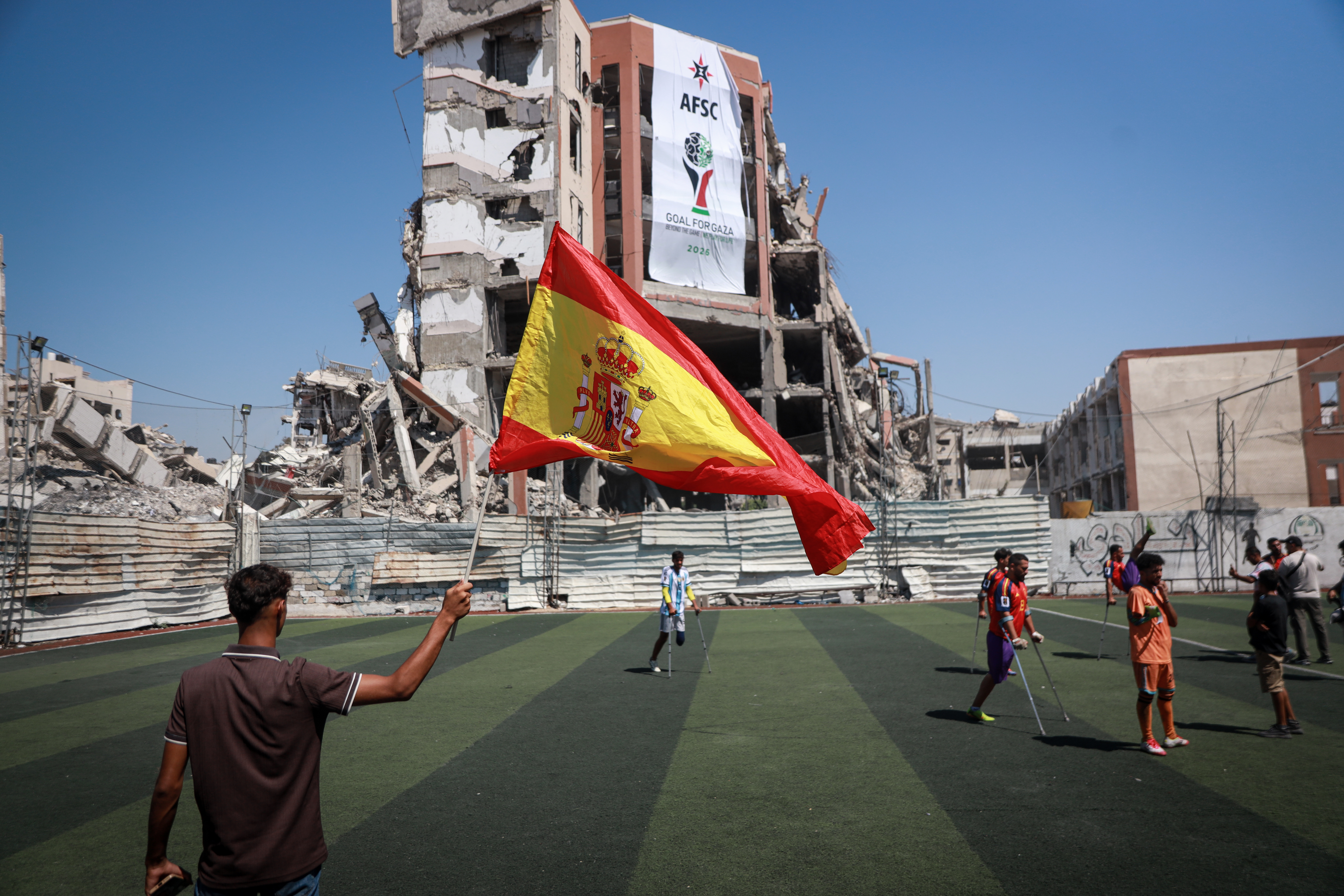 Fans raise the Spanish flag