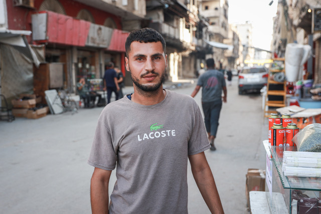 Ali al-Amsha says all he wants is to live peacefully after losing several family members during the war, including his parents [Abdelhakim Abu Riash/ Al Jazeera]