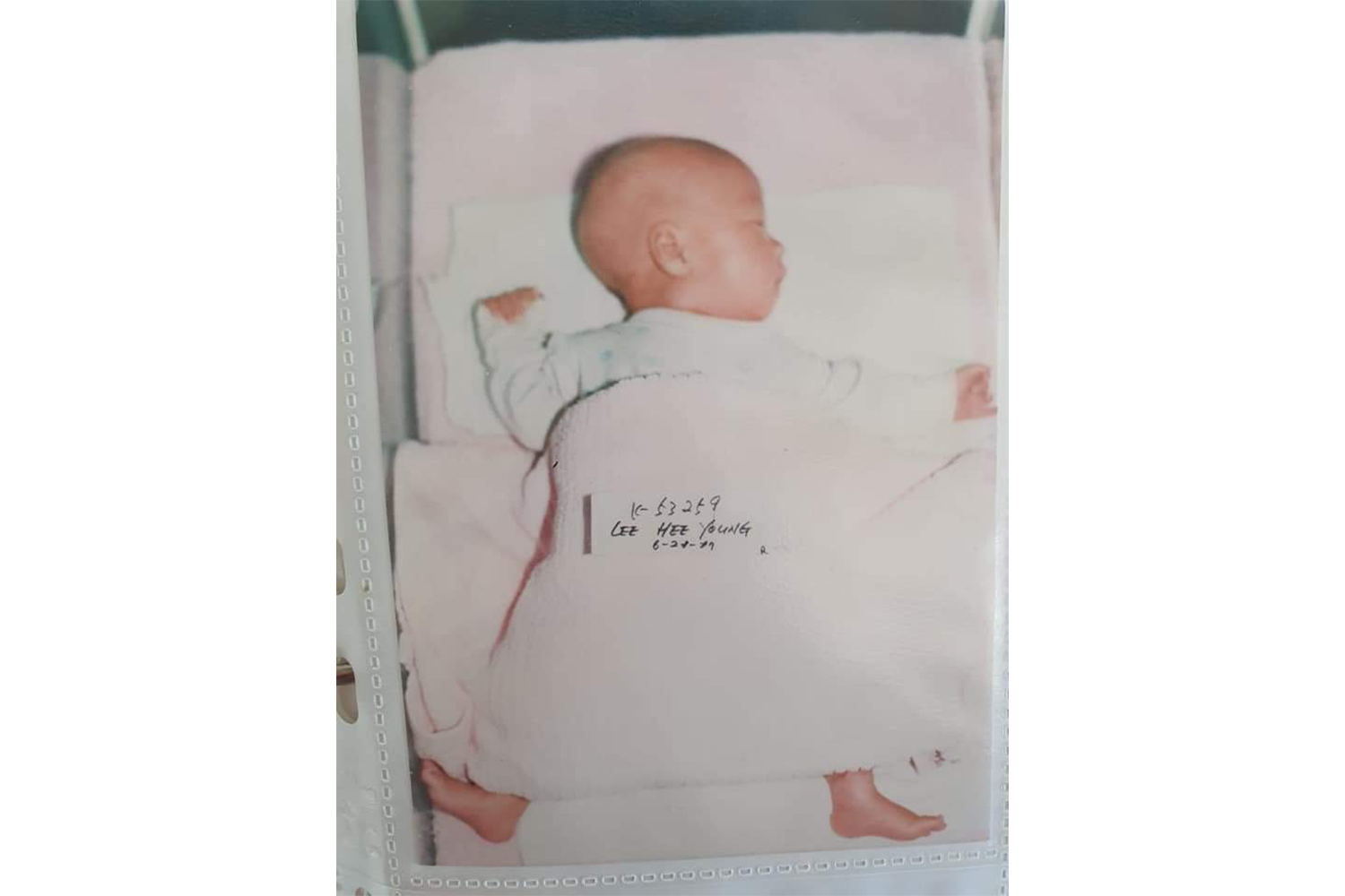 A photo of Mia Lee Hansen that was included in her adoption file [Courtesy of Mia Lee Hansen]
