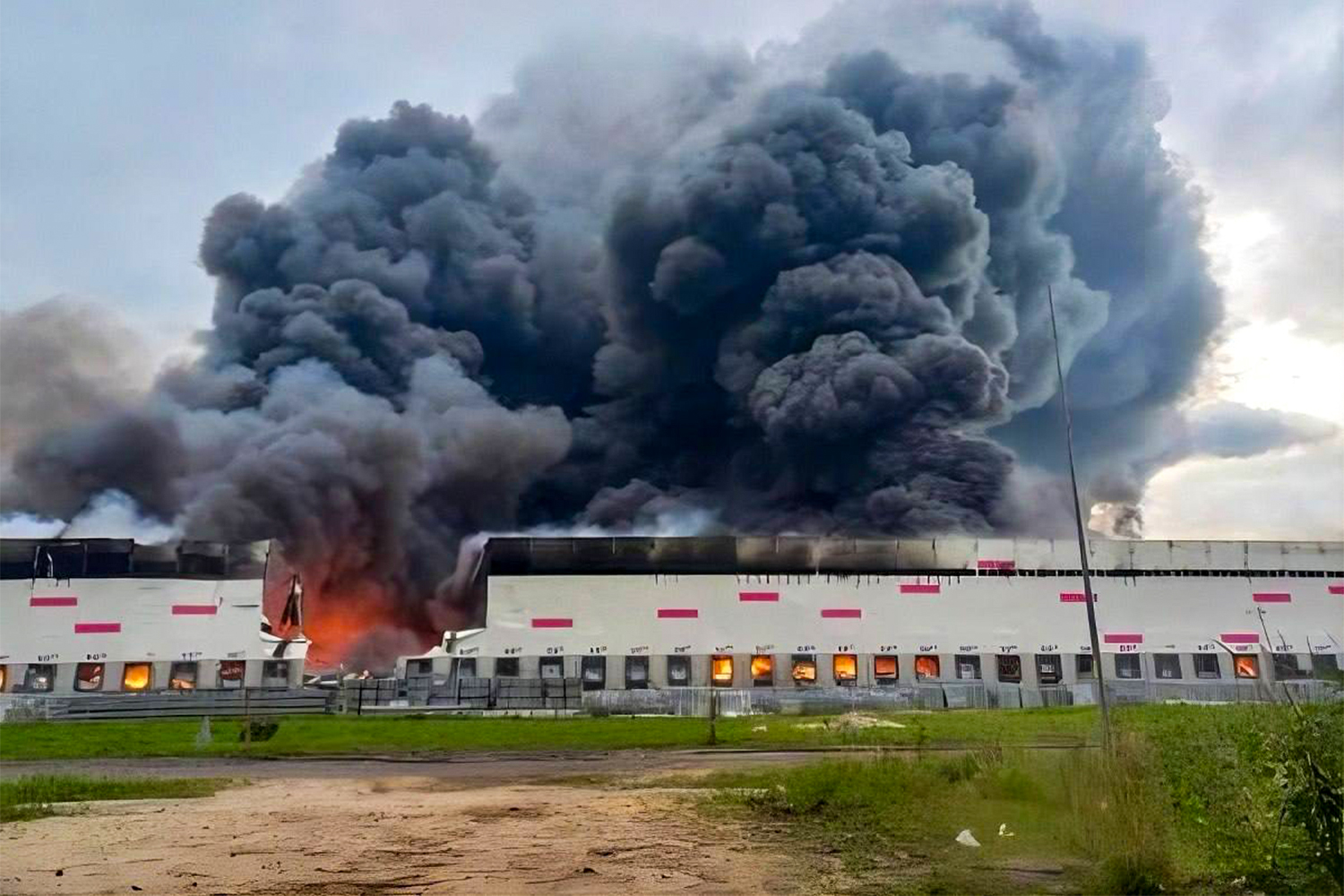 RYAZAN, RUSSIA - JULY 29: (----EDITORIAL USE ONLY - MANDATORY CREDIT - 'UKRAINE ONLINE TELEGRAM CHANNEL / HANDOUT' - NO MARKETING NO ADVERTISING CAMPAIGNS - DISTRIBUTED AS A SERVICE TO CLIENTS----) Smoke rises as firefighters work to extinguish a fire at Wildberries logistics hub following a Ukrainian drone attack in the Ryazan region of Russia on July 29, 2026. At least six people were reportedly injured and fires broke out at local industrial plants as a result of the strike. ( Ukraine Online Telegram Channel - Anadolu Agency )