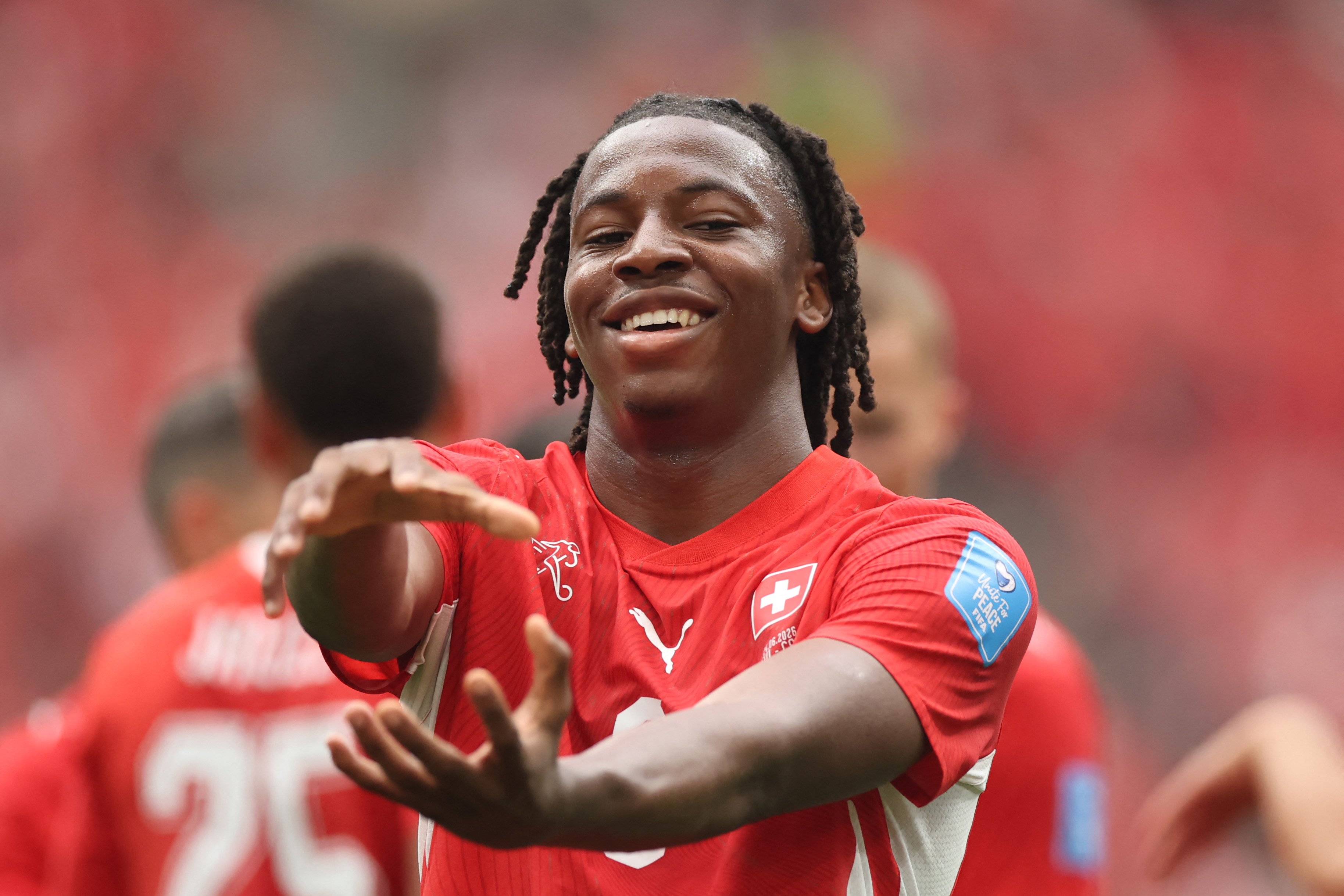 VANCOUVER, BRITISH COLUMBIA - JUNE 24: Johan Manzambi #9 of Switzerland celebrates scoring his team's second goal during the FIFA World Cup 2026 Group B match between Switzerland and Canada at BC Place Vancouver on June 24, 2026 in Vancouver, British Columbia. Alex Grimm/Getty Images/AFP (Photo by ALEX GRIMM / GETTY IMAGES NORTH AMERICA / Getty Images via AFP)