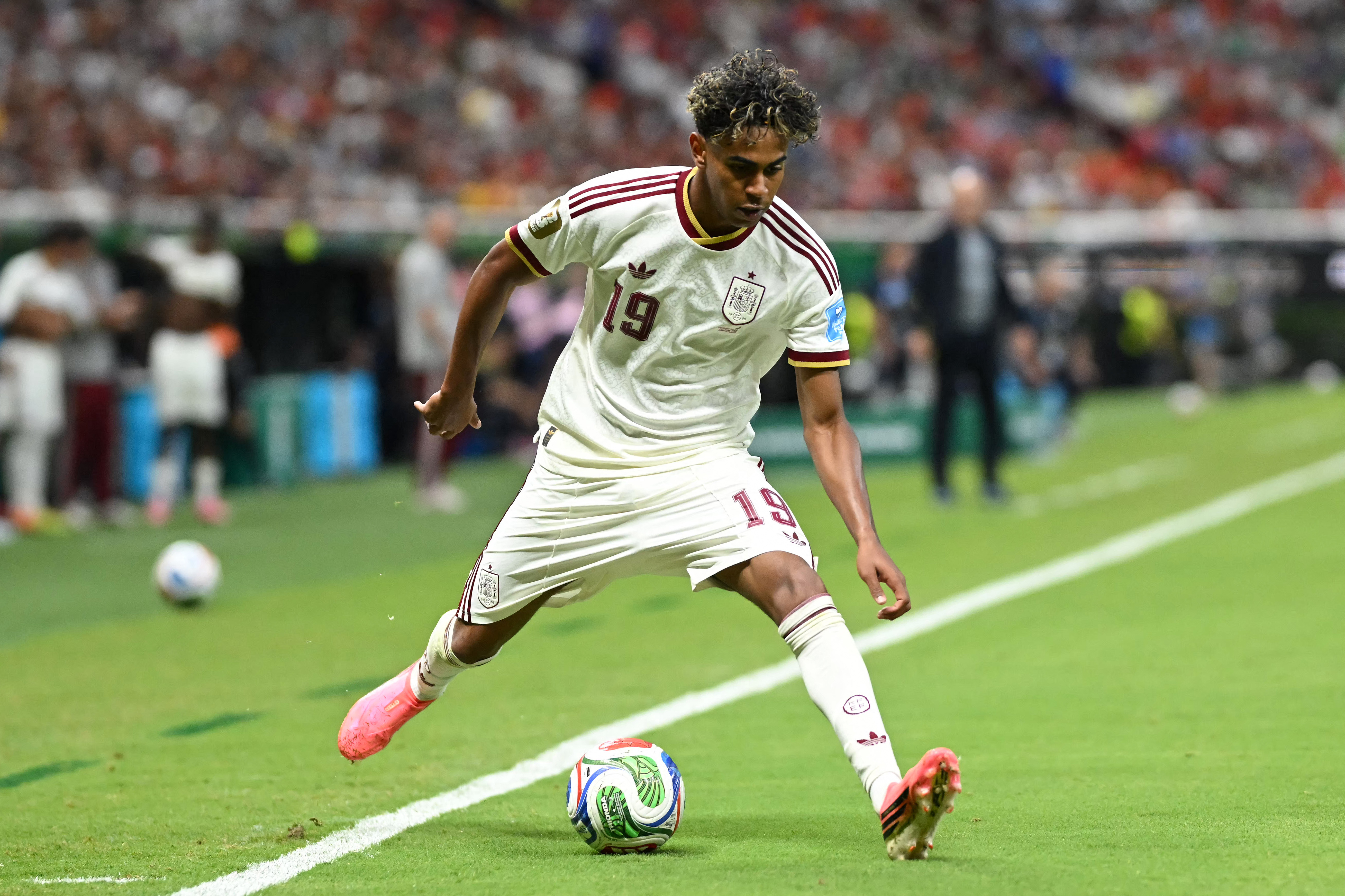 Spain's forward, Lamine Yamal controls the ball during the 2026 World Cup football match between Uruguay and Spain