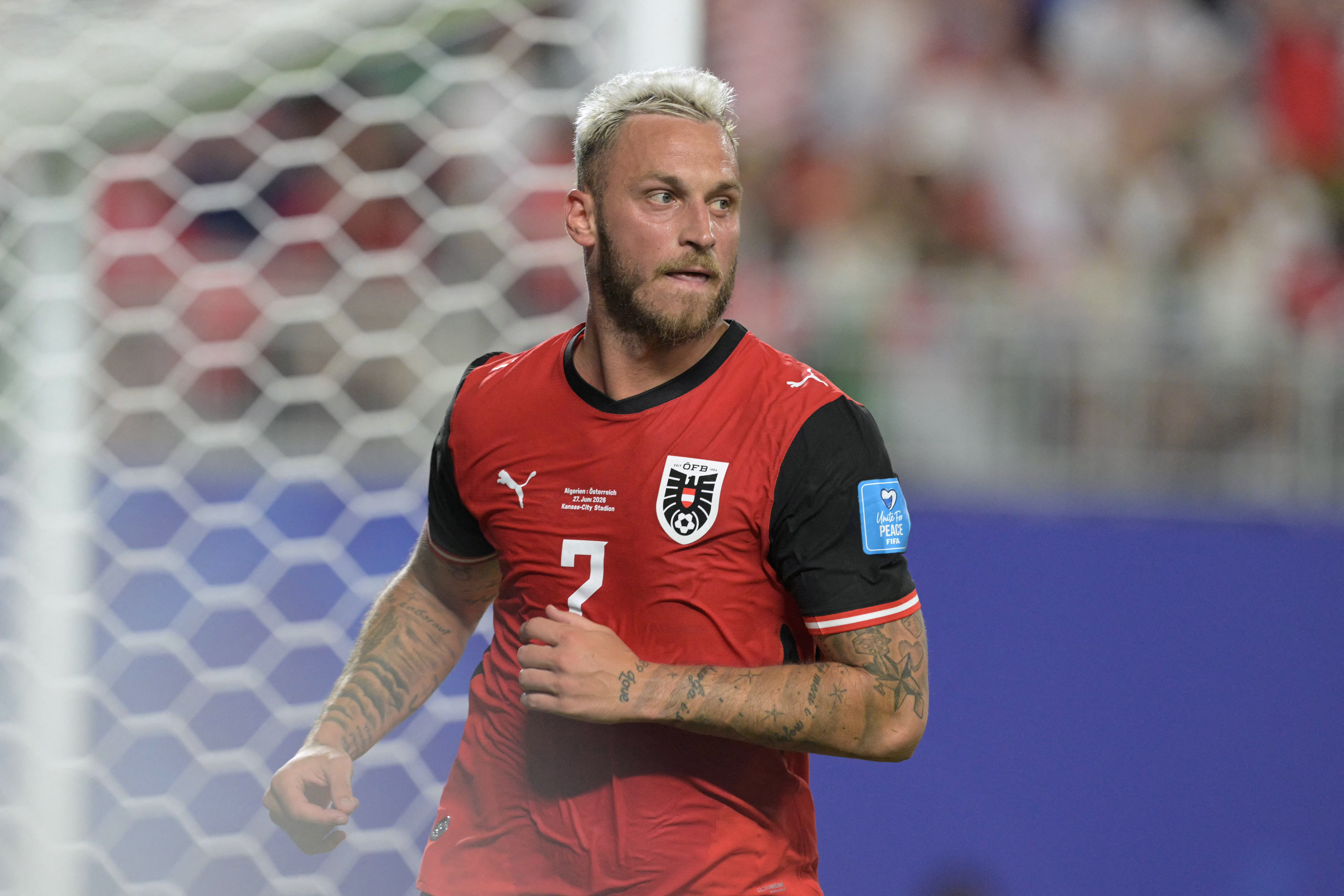 Austria's forward #07 Marko Arnautovic reacts after scoring his team's first goal during the 2026 World Cup Group J football match between Algeria and Austria at the Kansas City Stadium in Kansas City on June 27, 2026. (Photo by JUAN MABROMATA / AFP)