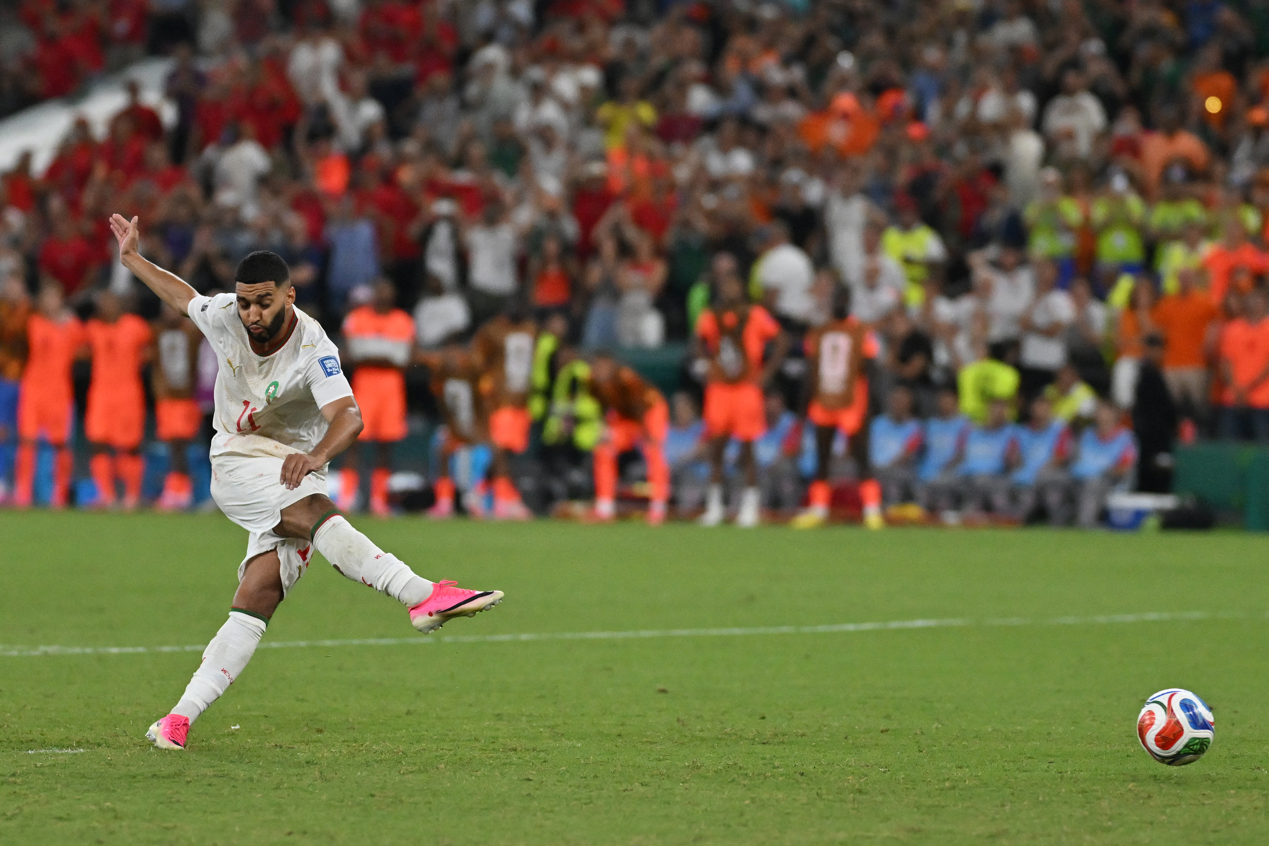 Midfielder Ismael Saibari shoots and scores the match-winning penalty for Morocco against Netherlands in the round of 32