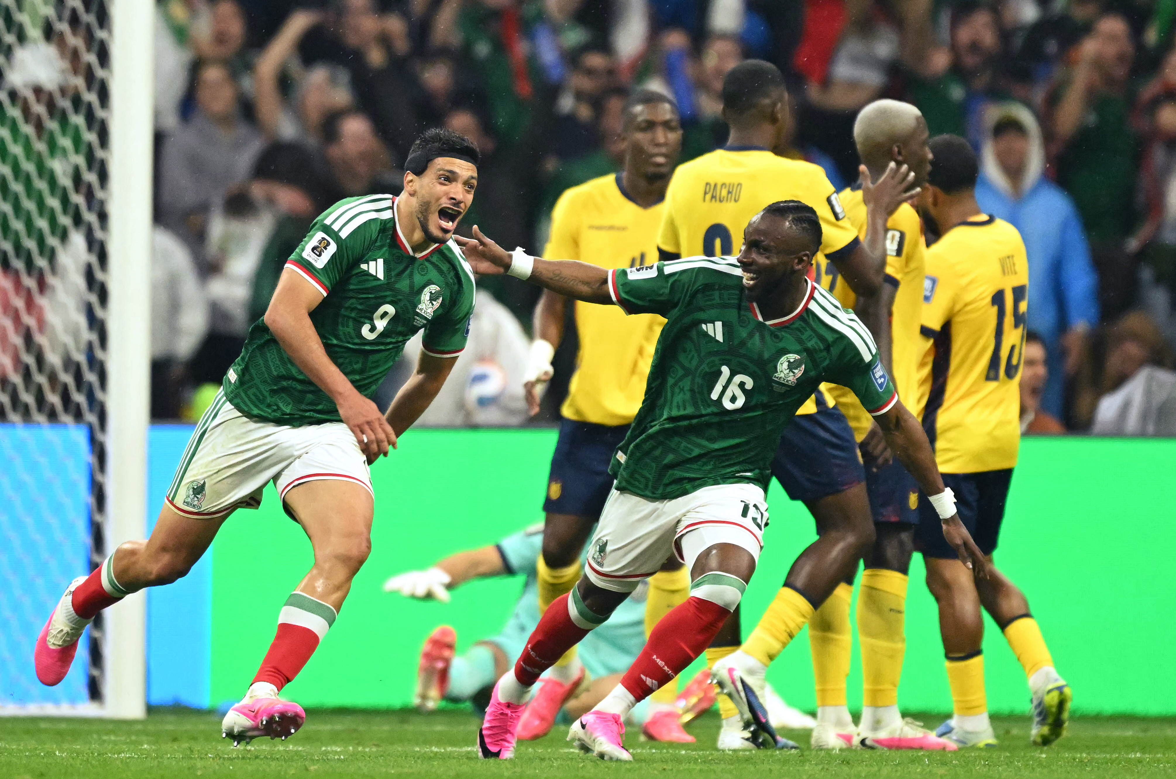Mexico’s Raul Jimenez, left, and Julian Quinones scored in the last game to send their team to the World Cup Round of 16