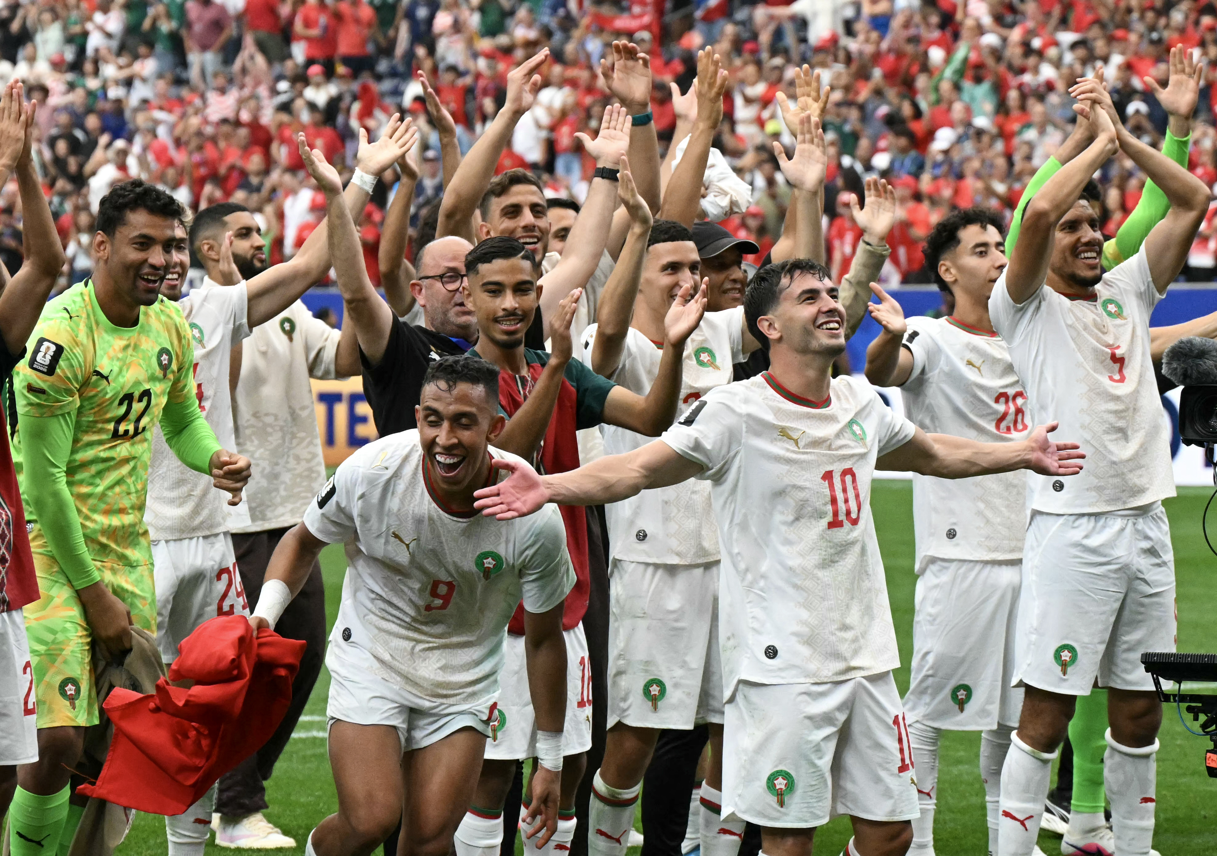 Morocco football players.celebrate.