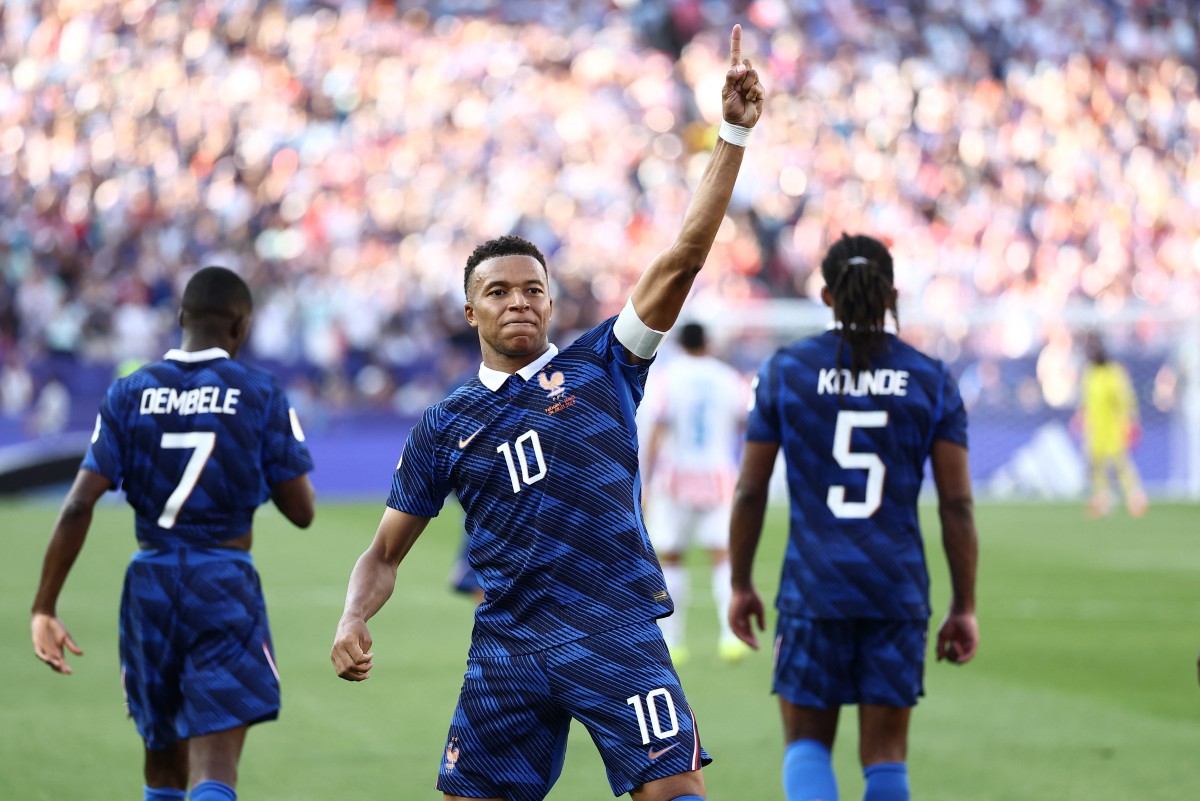 Kylian Mbappe celebrates his goal for France