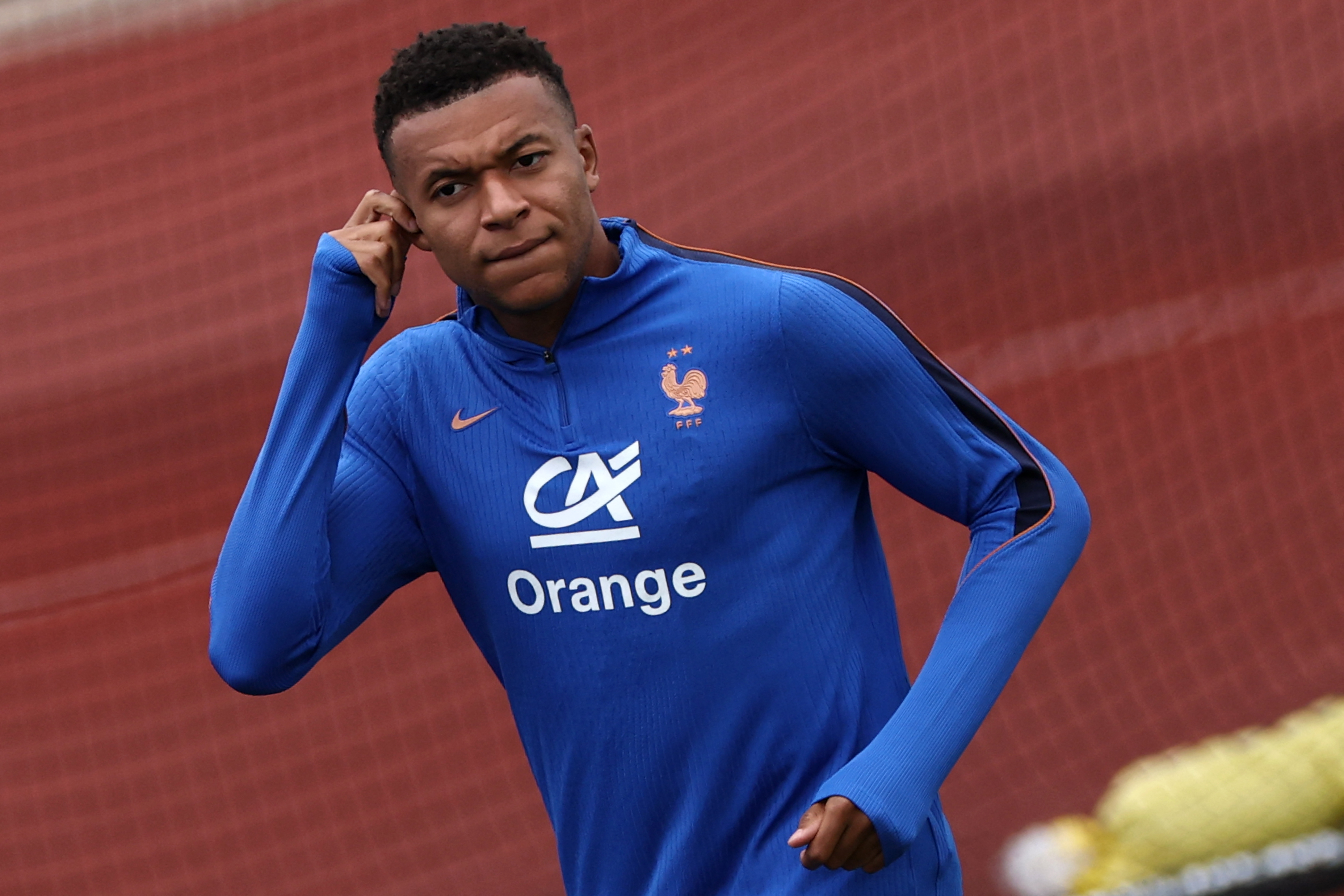 Kylian Mbappe reacts.