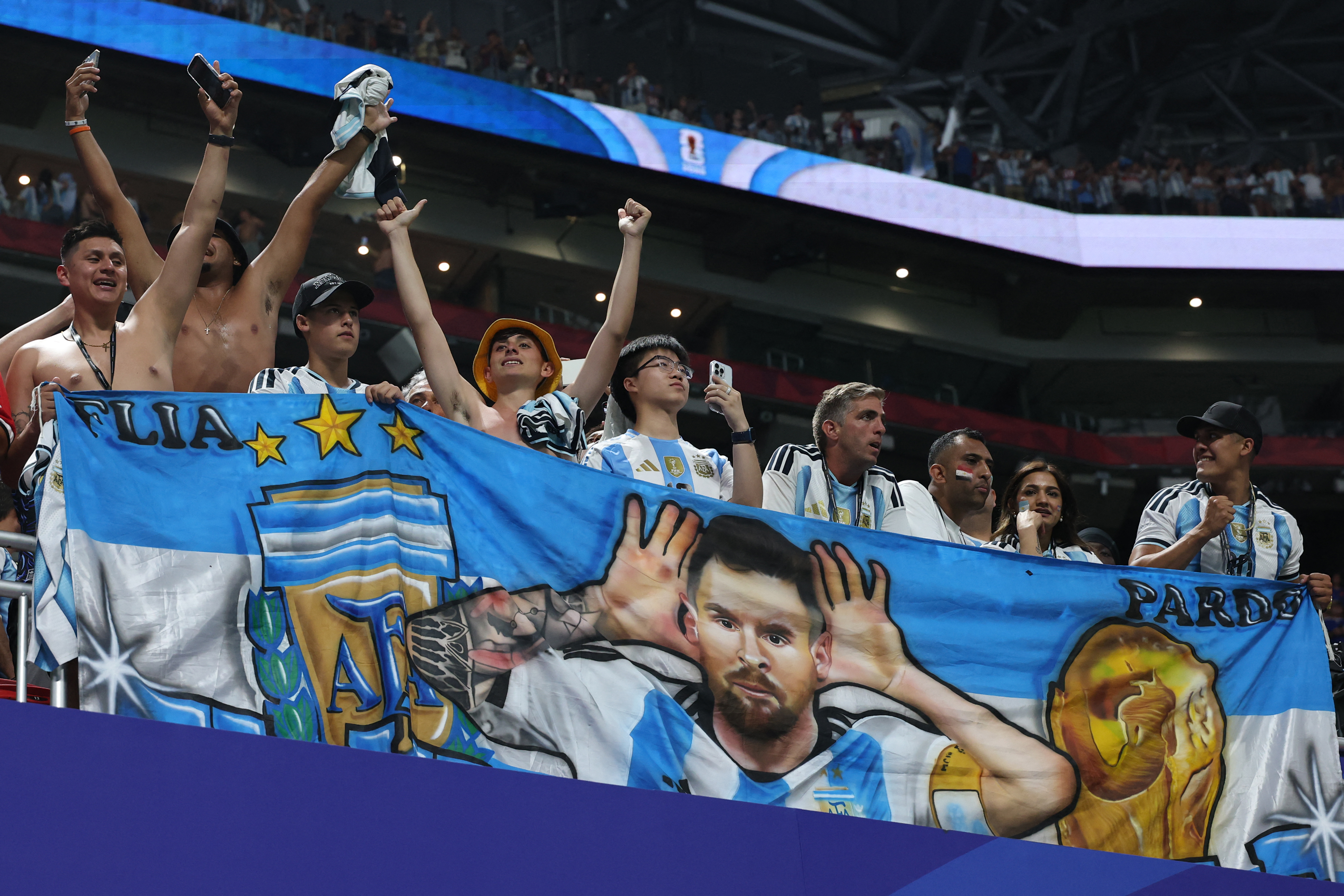 Argentina's fans celebrates at the end of the 2026 World Cup round of 16 football match between Argentina and Egypt at Atlanta Stadium in Atlanta on July 7, 2026. (Photo by Thomas COEX / AFP)