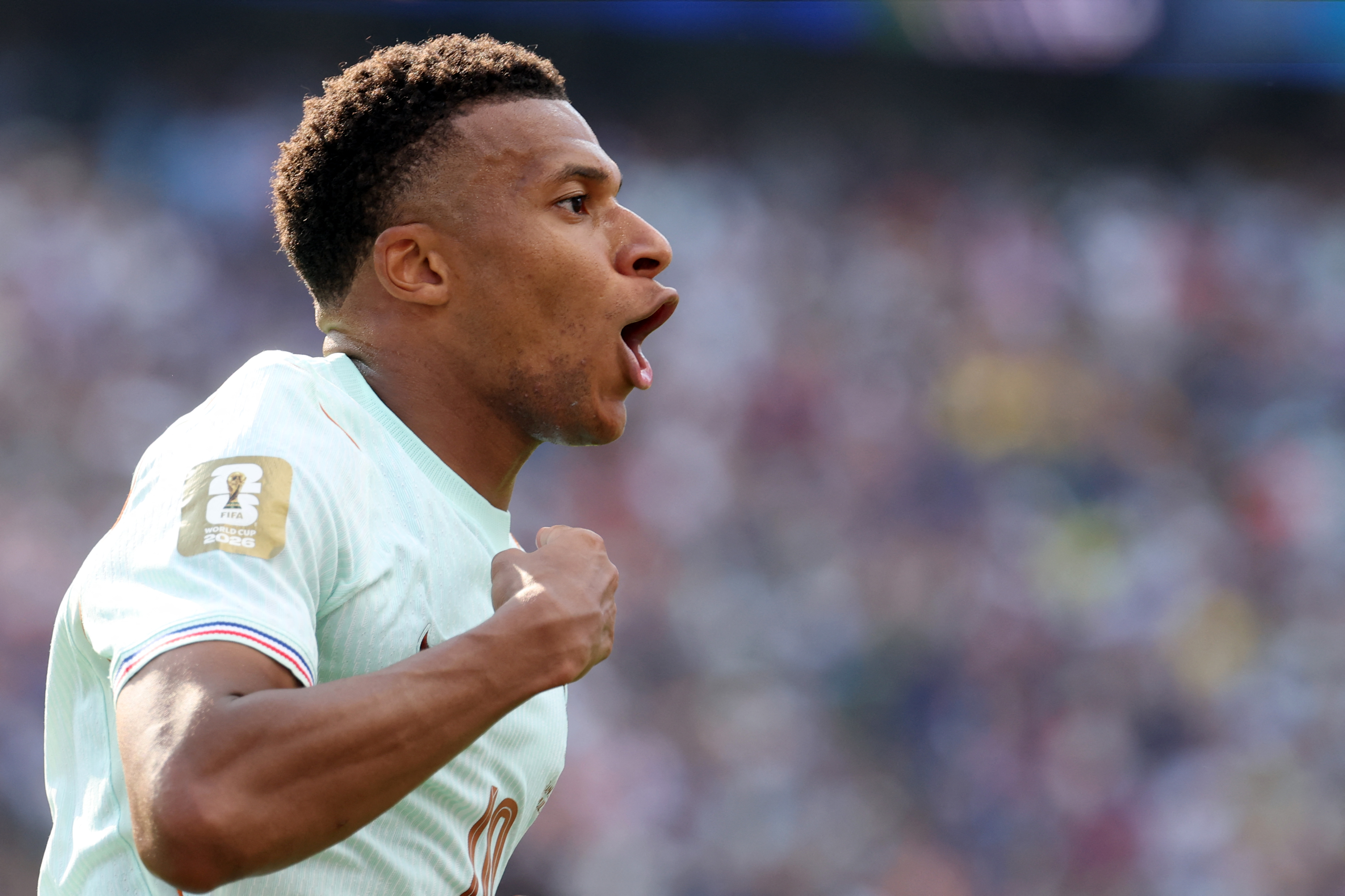 France's forward #10 Kylian Mbappe celebrates scoring his team's first goal during the 2026 World Cup football tournament quarter-final match between France and Morocco at Boston Stadium in Foxborough on July 9, 2026. (Photo by Odd ANDERSEN / AFP)