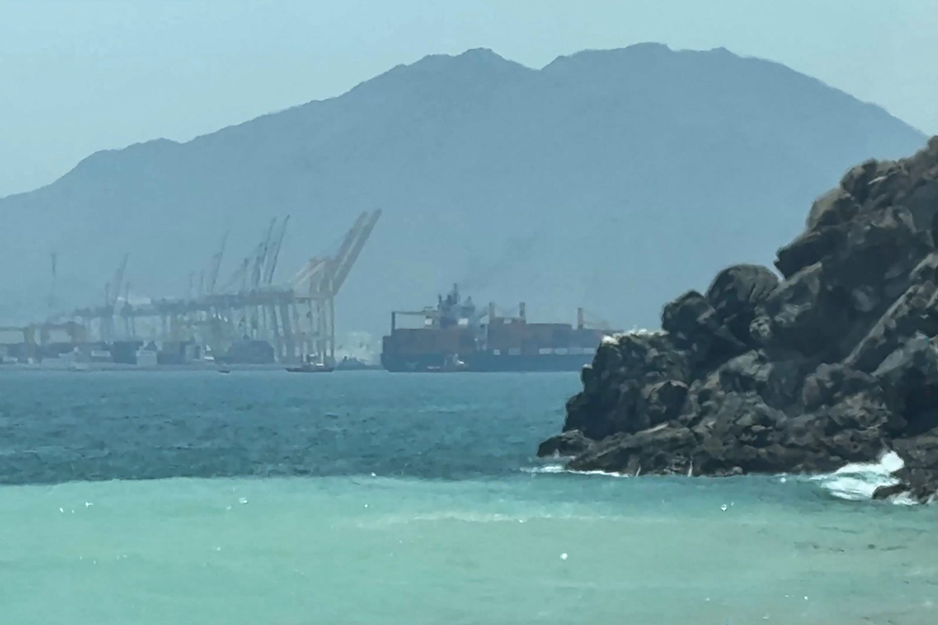 A ship sails near the Strait of Hormuz (AFP)