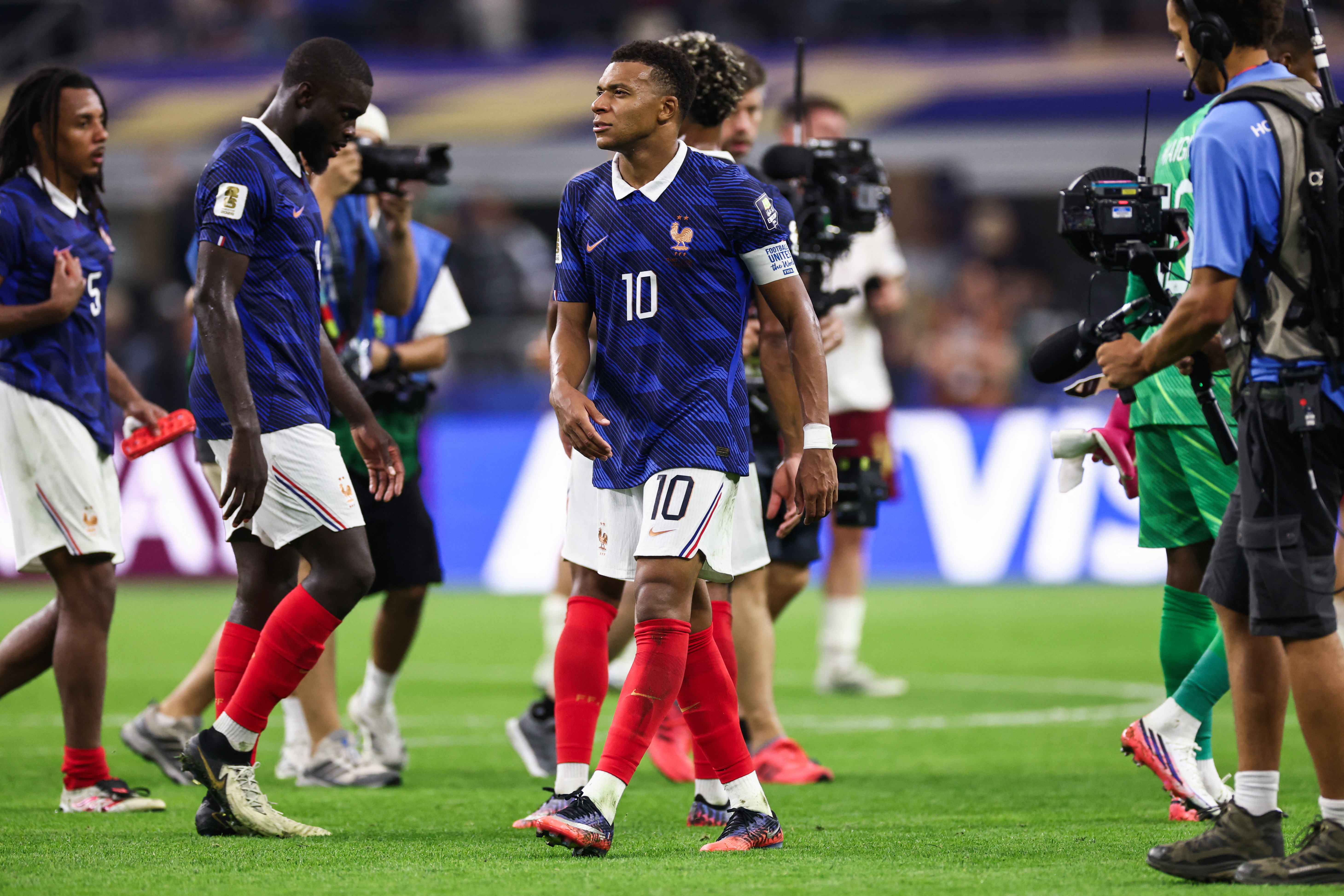 France's forward #10 Kylian Mbappe reacts after losing the 2026 World Cup football tournament semi-final match